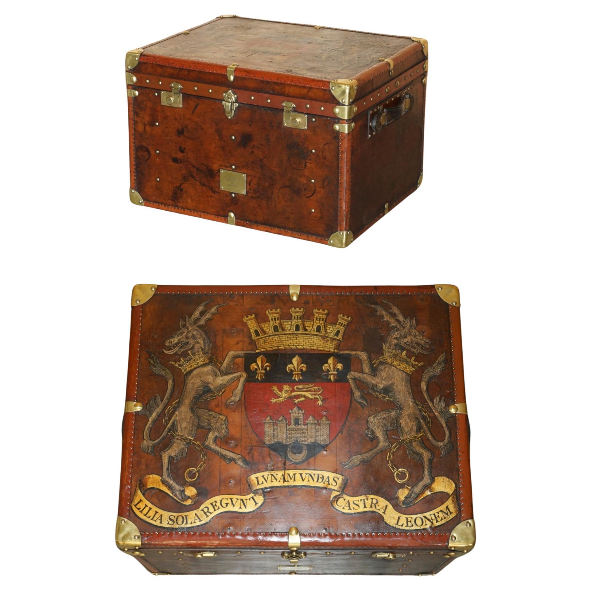 ONE OF A KiND ANTIQUE BROWN LEATHER STEAMER TRUNK WITH ARMORIAL COAT OF ARMS For Sale