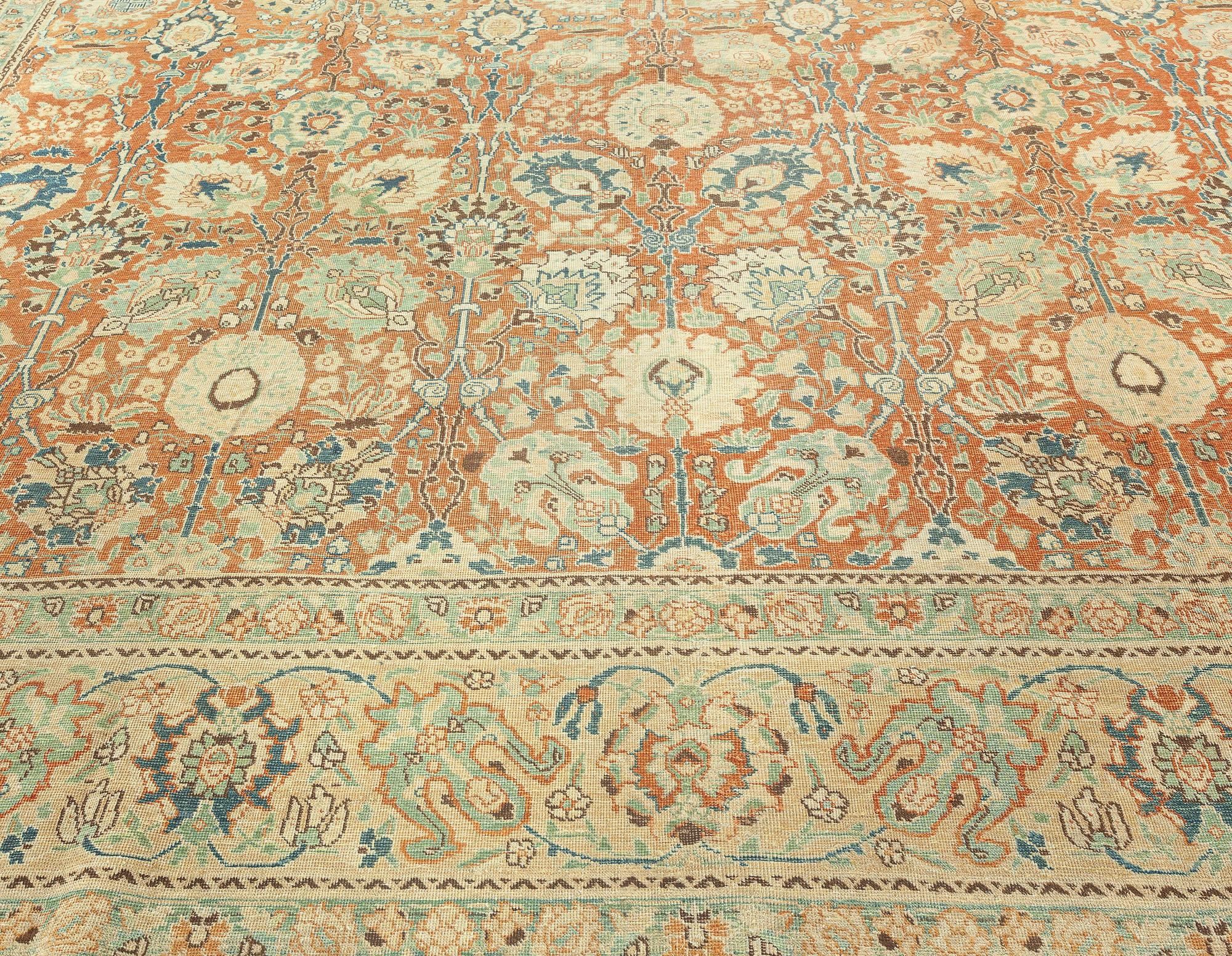 One-of-a-kind Antique Persian Tabriz botanic rug
Size: 10'9