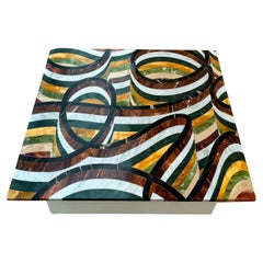 LOOPS: One of a kind, artist-designed table in marble and granite