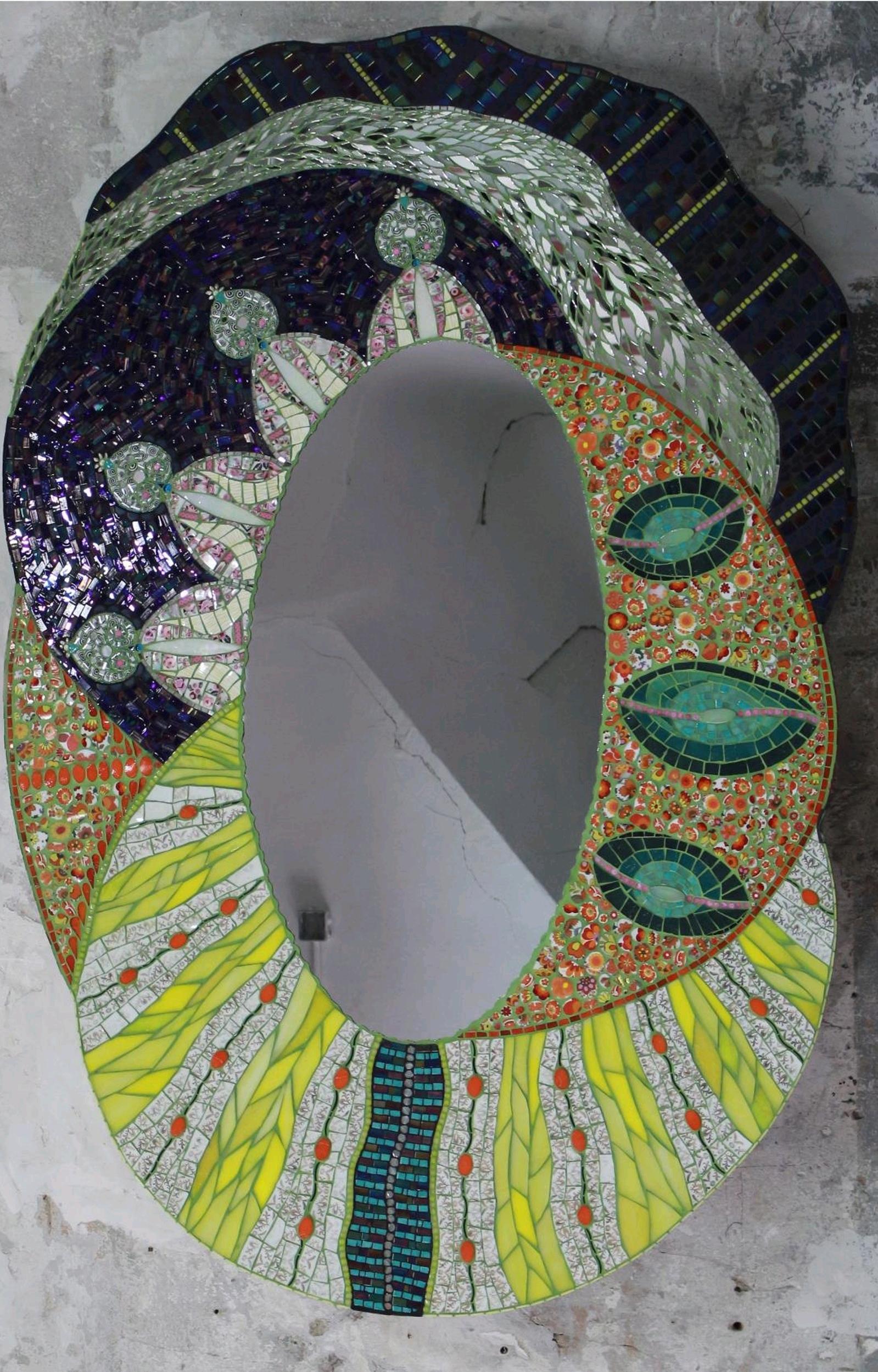 One of a kind stunning mosaic mirror, created by the artist using original vintage small customized covered in fragments of ceramic, porcelain dishes, old China, mirrors, glass, etc. All these different materials are gather together and hand cut one