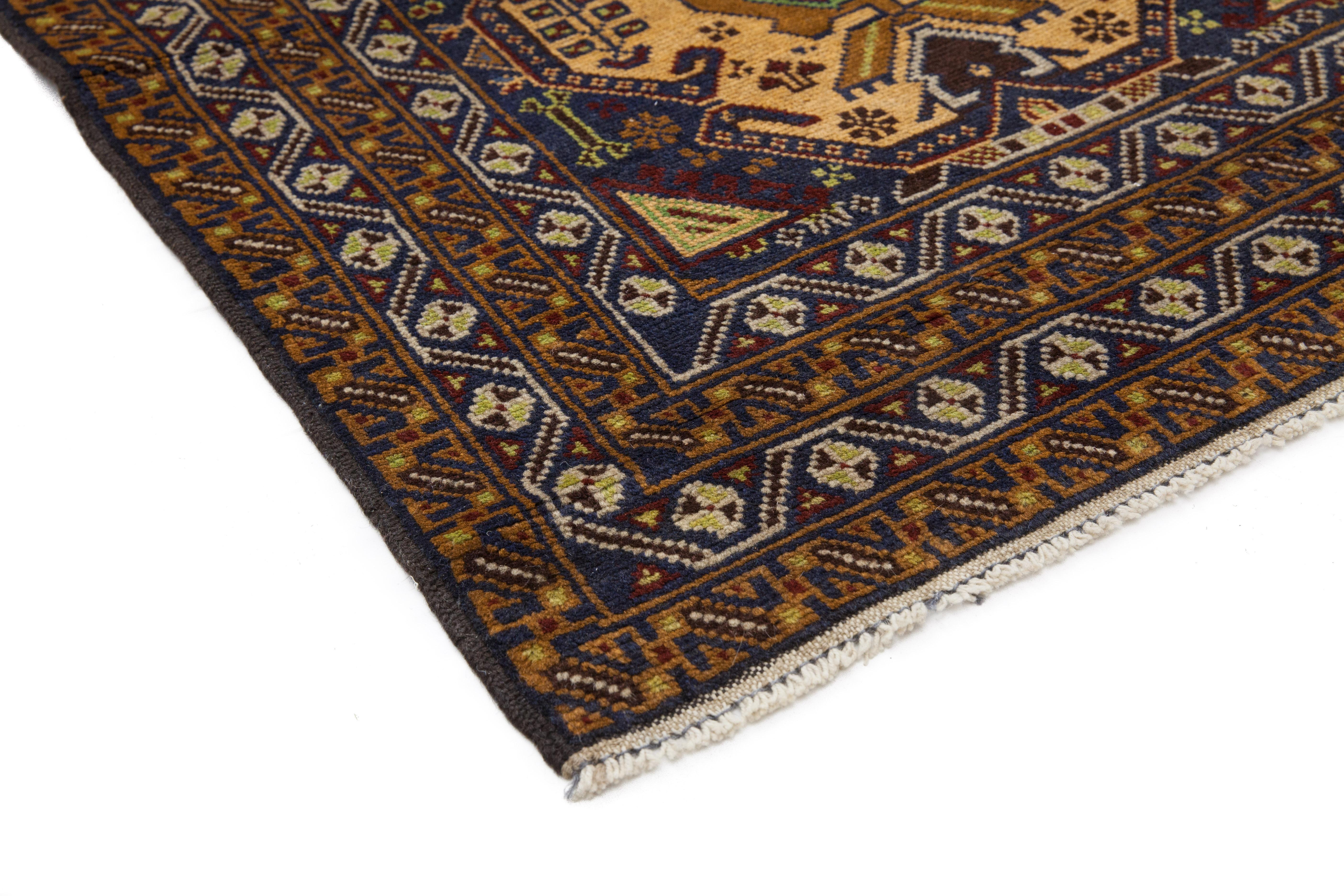 Color: Caramel - Made in: Pakistan. The rich textile tradition of western Africa inspired the Tribal collection of hand knotted rugs. Incorporating a medley of geometric motifs, in palettes ranging from earthy to vivacious, these rugs bring a sense