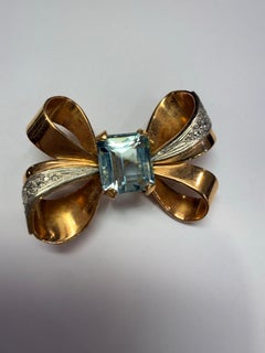 One of a kind bow brooch with natural aquamarine & diamonds 18KT