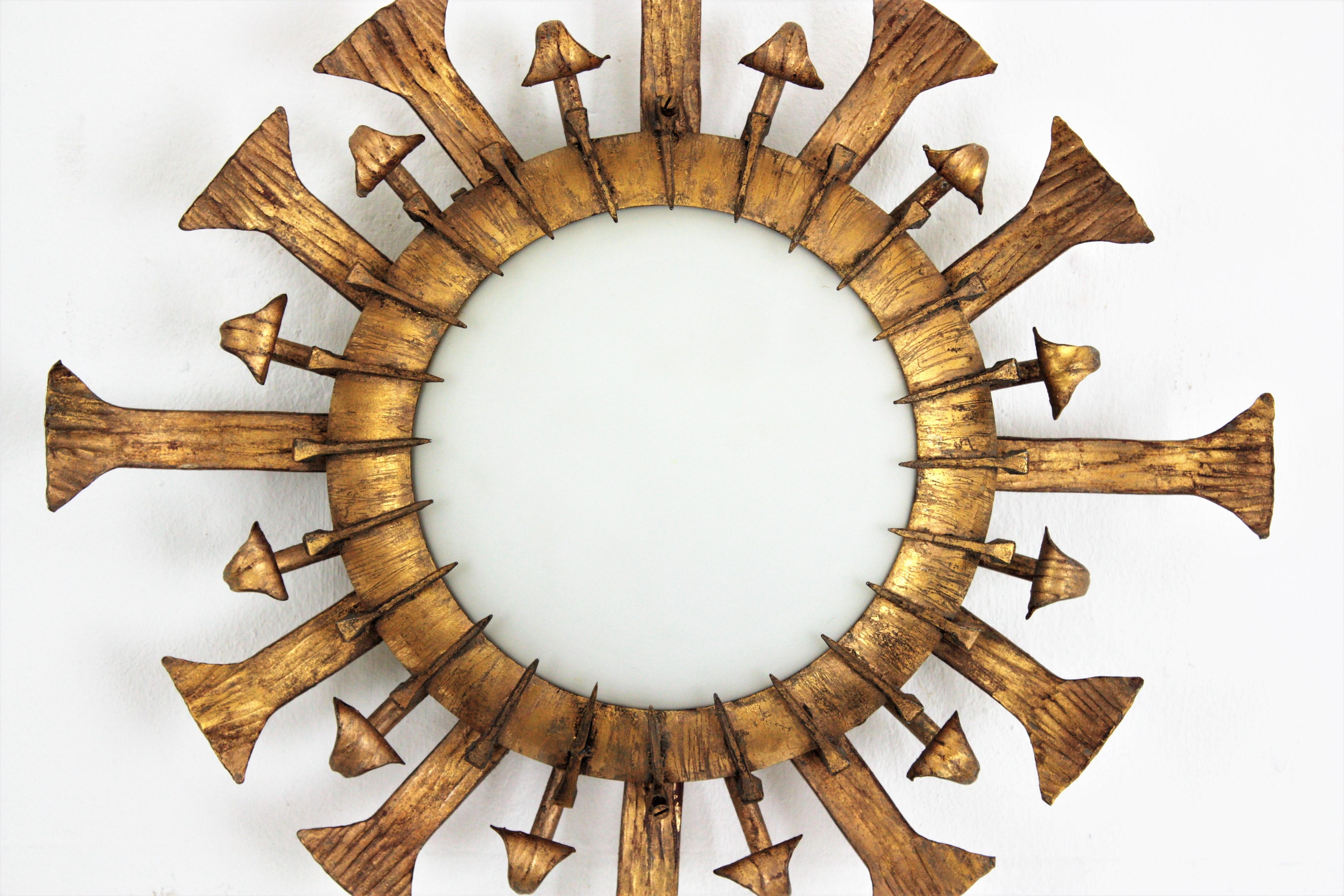 Forged One of a kind Brutalist Sunburst Flushmount with Nails Accents in Gilt Iron
