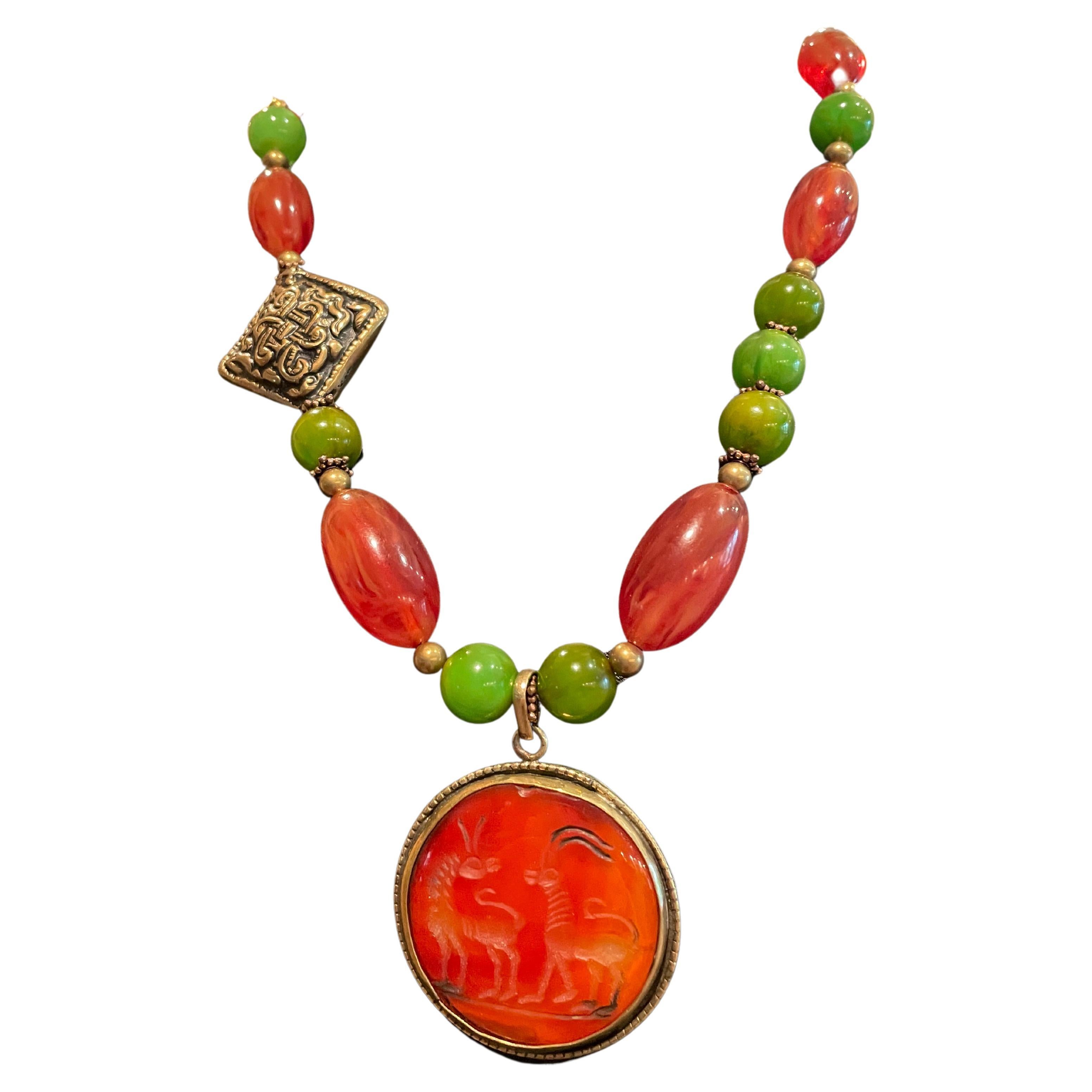 One of a kind , carved, vintage, carnelian Chinese pendant with Bakelite beads