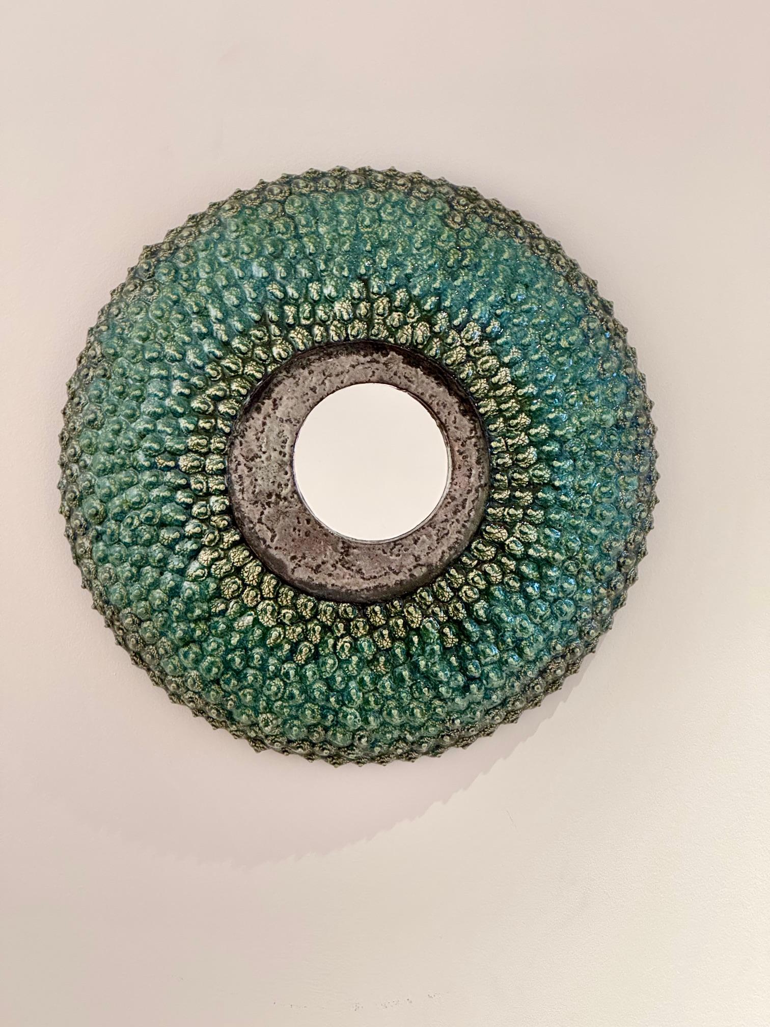 Hand-sculpted ceramic Mirror or decorative wall sculpture
One of a kind piece signed by the French ceramicist Margareth Leveneur
Possibility to add other different mirrors to get a set on wall .
Margareth Leveneur was born in 1971 and exposed her