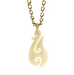 One of a kind Classic Carved Bone Sailors Hook on 18K and Diamonds Bail Pendant
