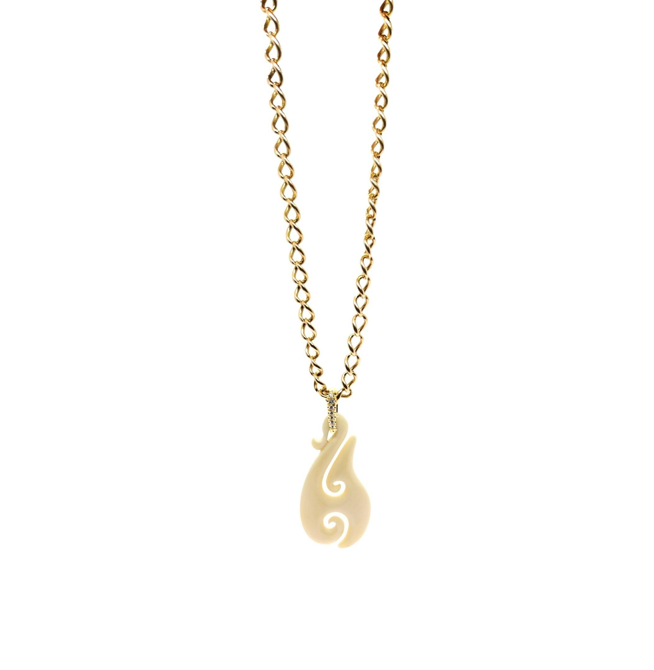 Contemporary One of a kind Classic Carved Bone Sailors Hook on 18K and Diamonds Bail Pendant For Sale