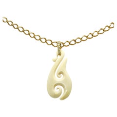 One of a kind Classic Carved Bone Sailors Hook on 18K and Diamonds Bail Pendant