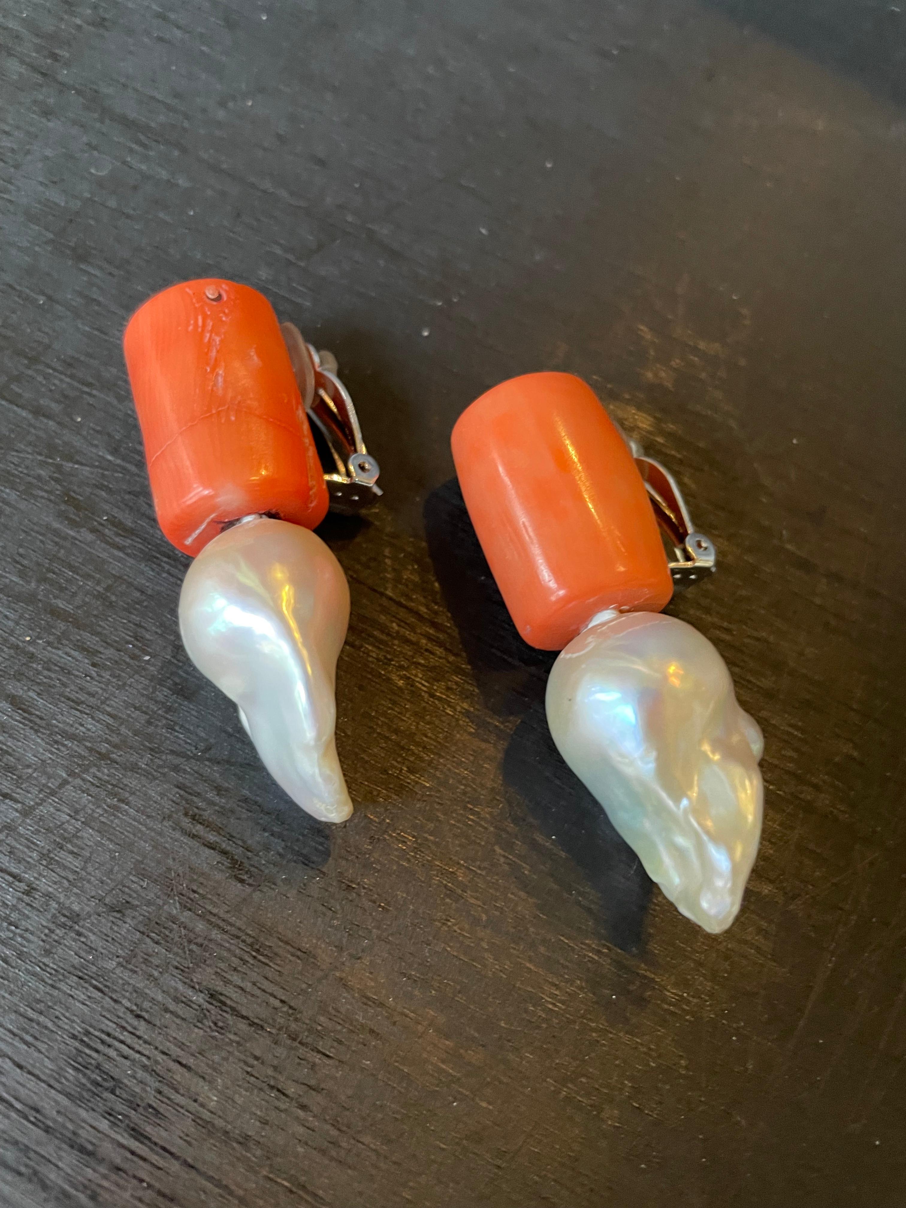 One-of-a-kind statement earrings from the Danish jewellery brand, Monies. 
Made in Coral and Baroque Pearls with a clip-on in sterling silver. 

Handcrafted in the Monies Atelier in Copenhagen.