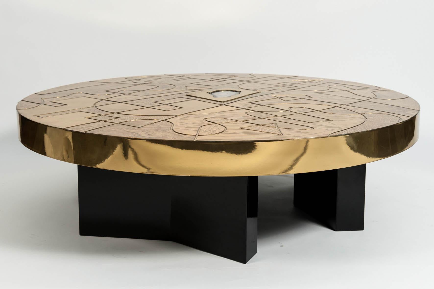 Etched brass coffee table with a constructivism design 
attributed to Willy Daro.