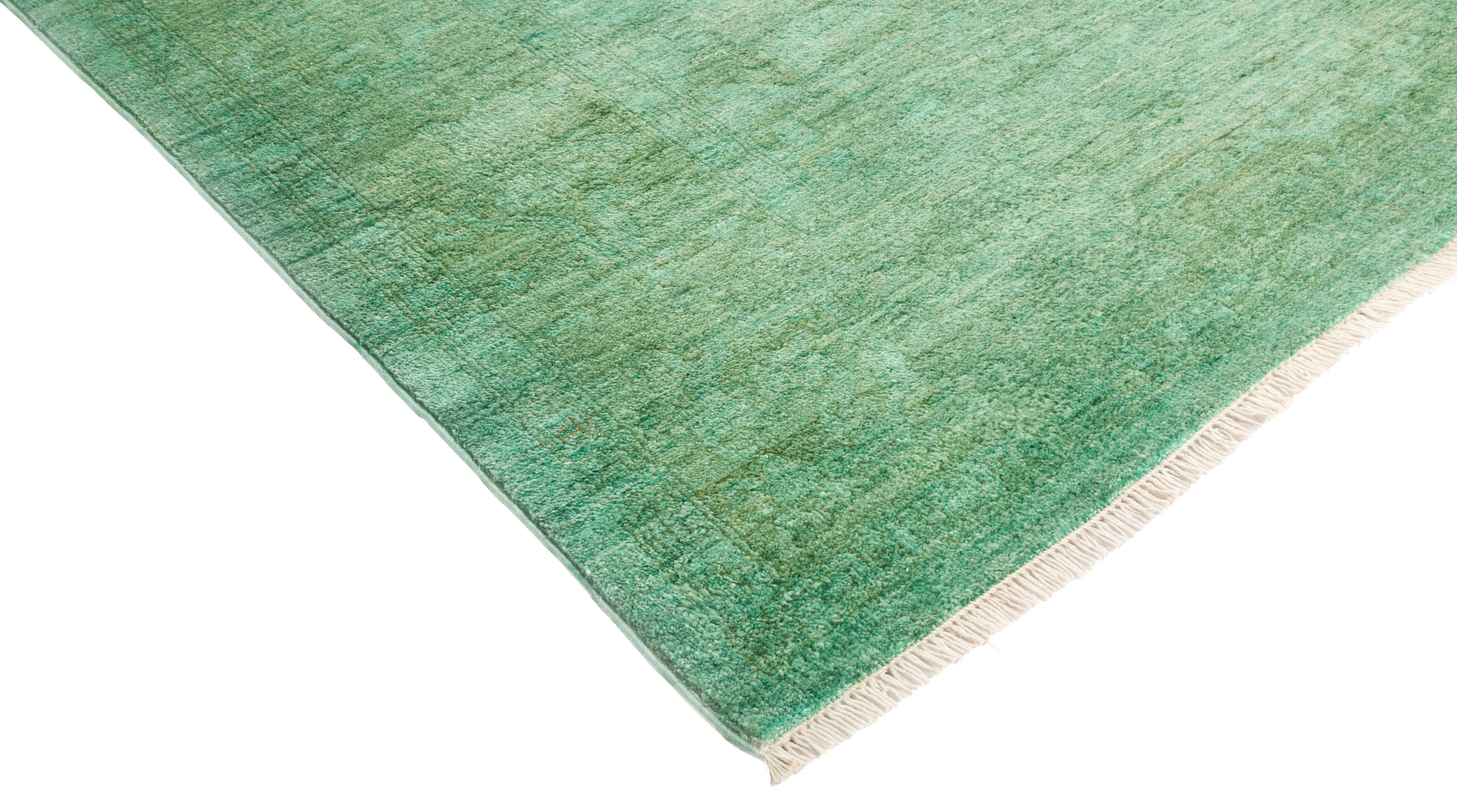 Color: Green, made in: Pakistan. 100% wool. The colorful collection epitomizes Classic with a twist: traditional patterns overdyed in brilliant color. Each hand knotted rug is washed in a 100%-natural botanical dye that reveals hidden nuances in the