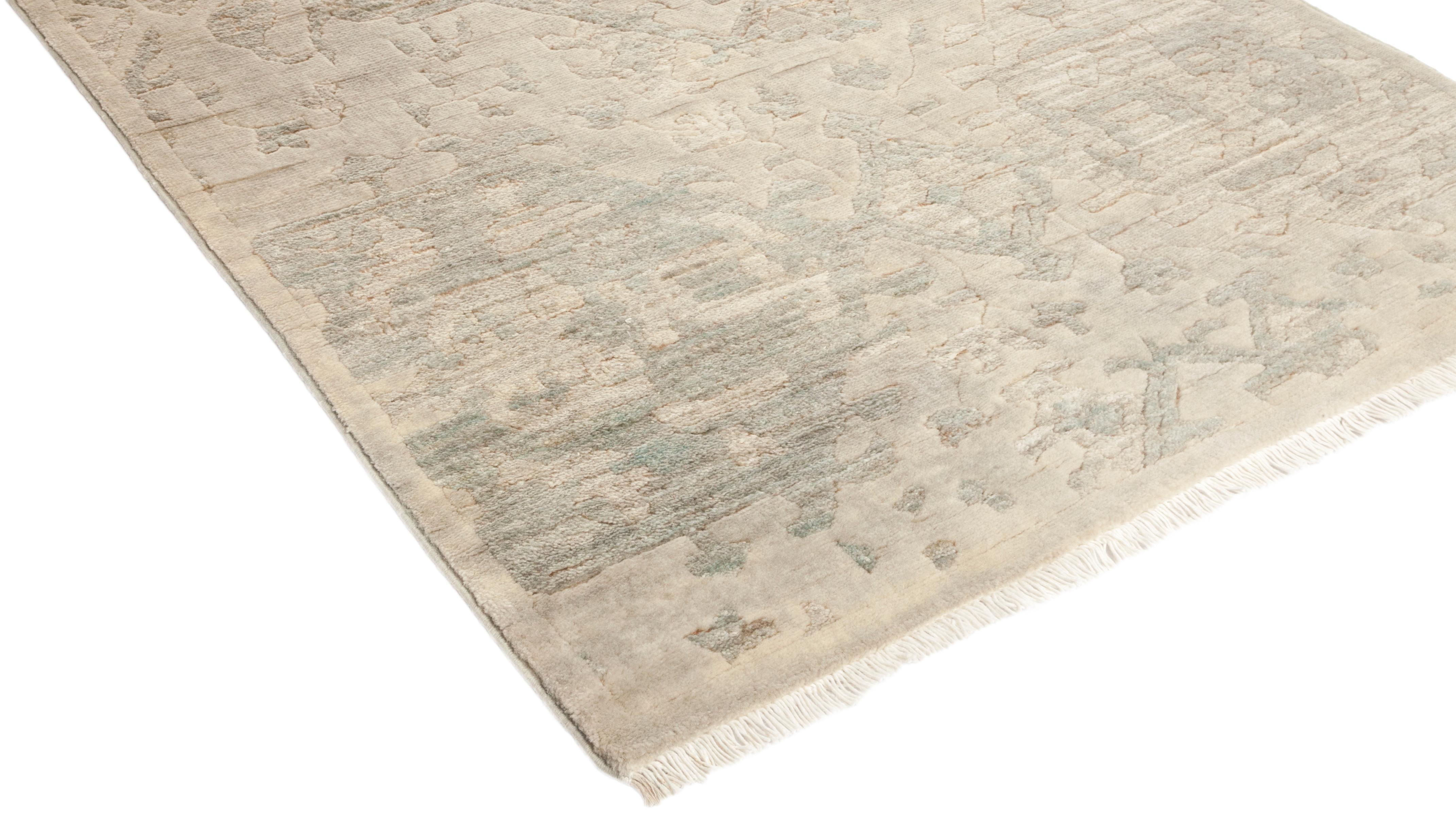 Color: Beige - Made in: Pakistan. 100% wool. The Colorful collection epitomizes classic with a twist: traditional patterns overdyed in brilliant color. Each hand knotted rug is washed in a 100%-natural botanical dye that reveals hidden nuances in