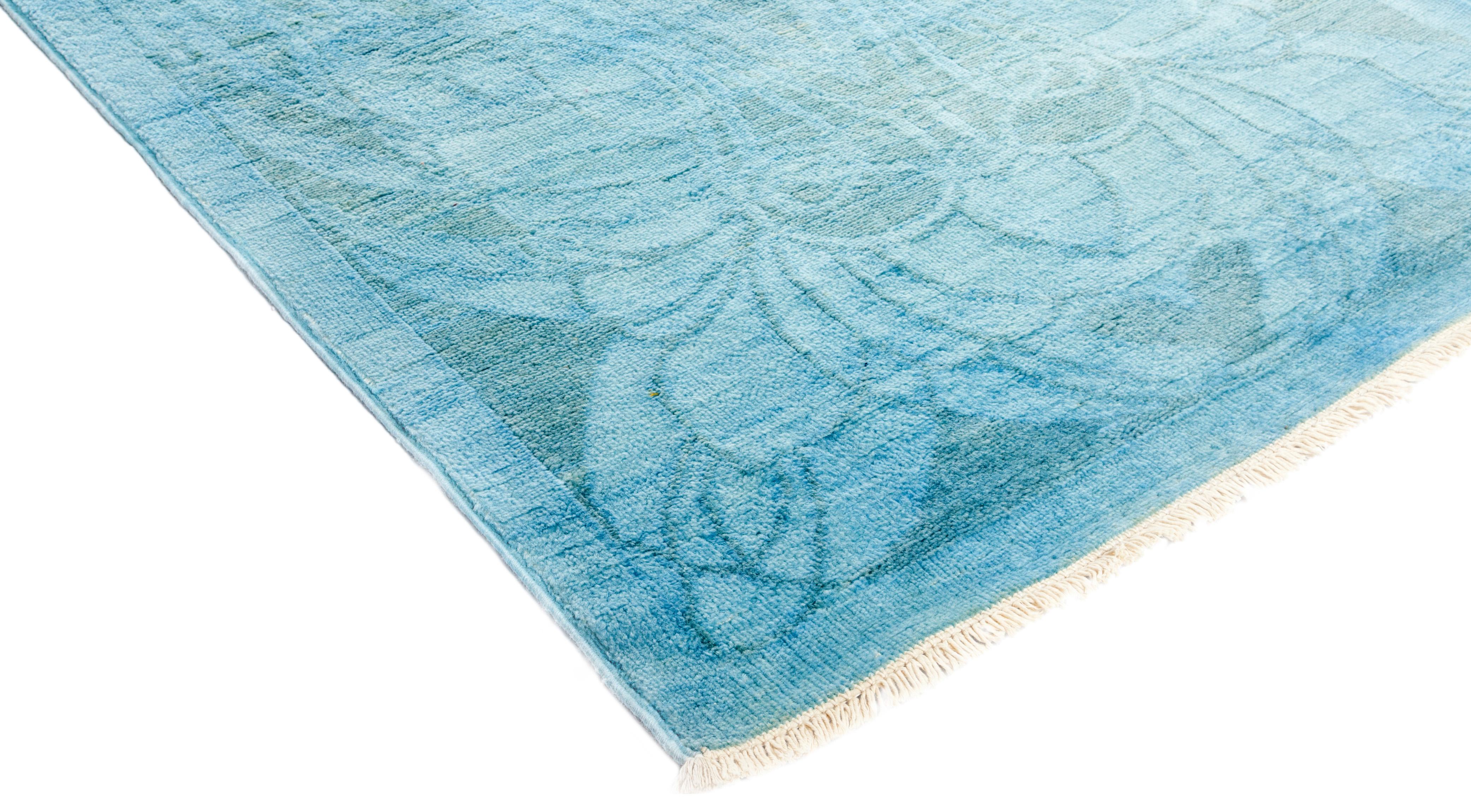 Color: Blue, made in Pakistan. 100% wool. The Colorful collection epitomizes Classic with a twist: traditional patterns overdyed in brilliant color. Each hand knotted rug is washed in a 100%-natural botanical dye that reveals hidden nuances in the