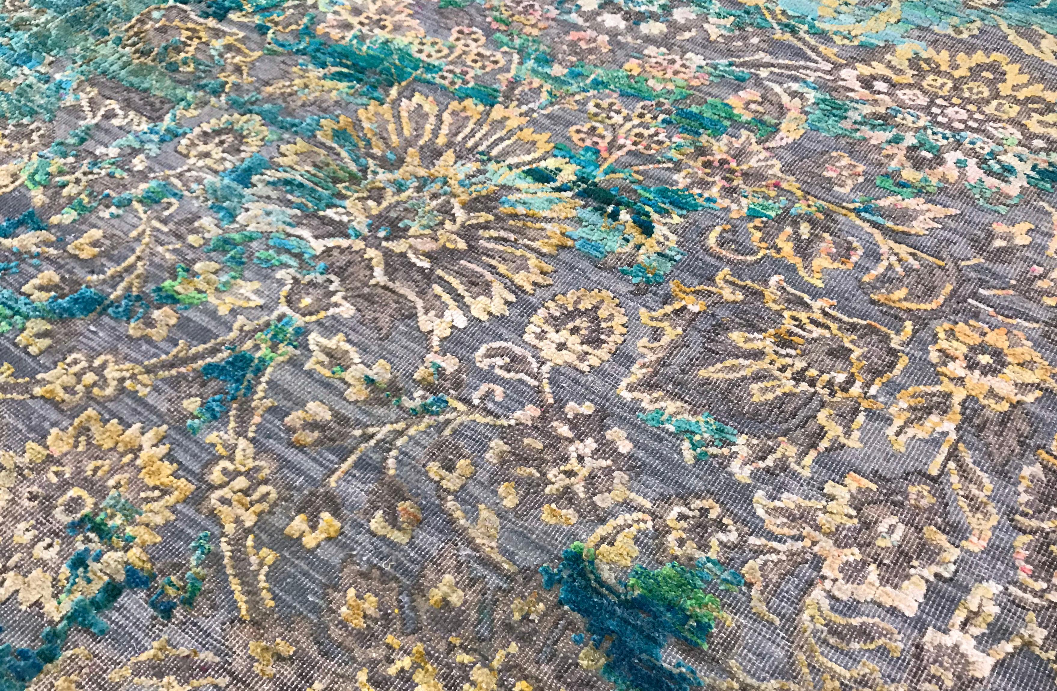 This elegantly handwoven rug is from India and woven from the finest wools and cottons to create a soft and luxurious piece that will work well in so many different settings. Measures: 4’9” x 9’11”.
  