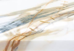 Collectible design marble center table with golden scar by Roos Schneijderberg