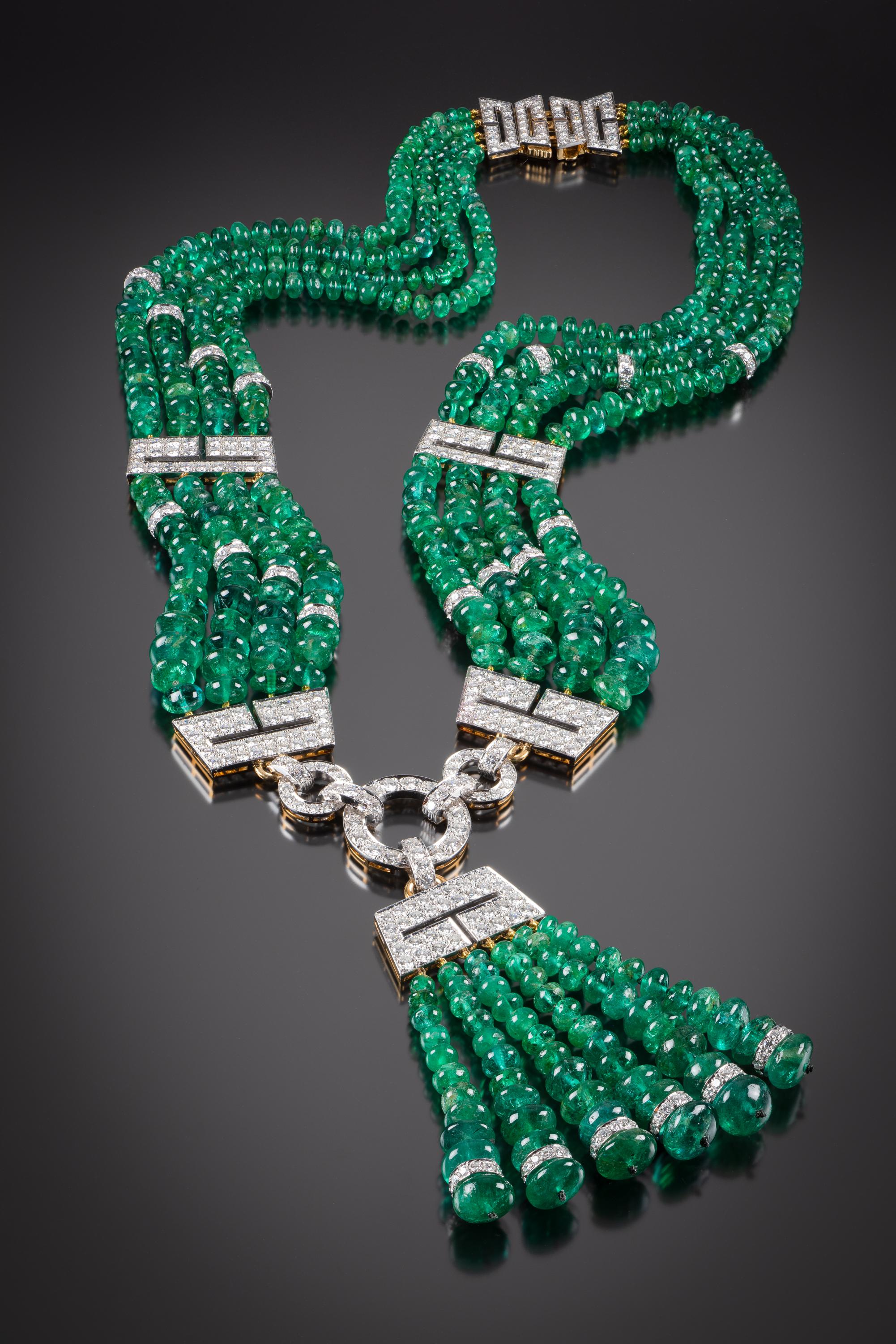 This magnificent David Webb emerald and diamond fringe necklace is a one-of-a-kind vintage treasure created for a longtime client of Webb’s. It is composed of four graduated rows of emerald beads interspersed by Art Deco-inspired openwork panels