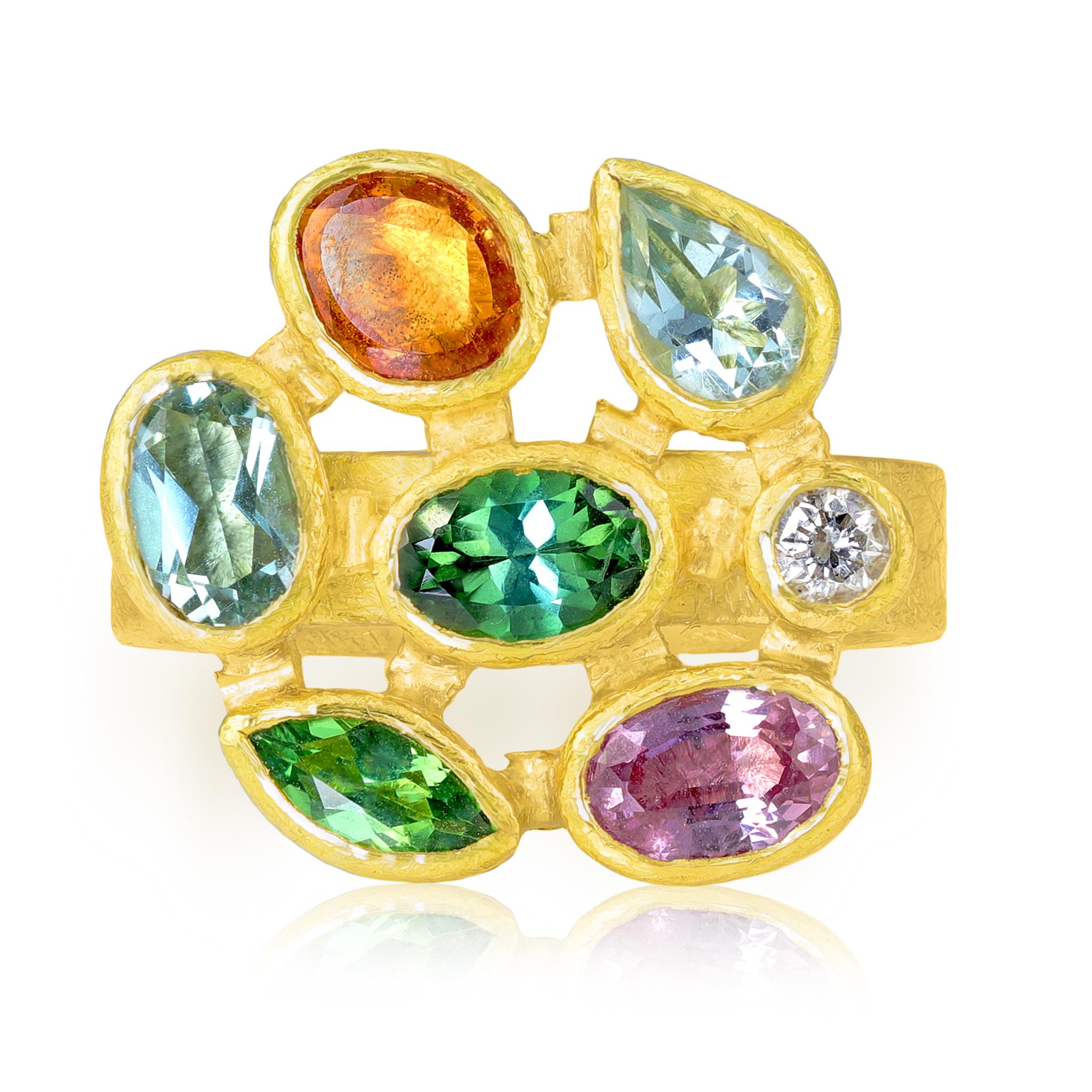 One of a Kind Mosaic Ring handfabricated by award-winning jewelry maker Petra Class showcasing a stunning assortment of brilliant-cut and rose-cut aquamarine, pink sapphire, orange sapphire, green tourmaline, and white diamond in a mix of shapes,