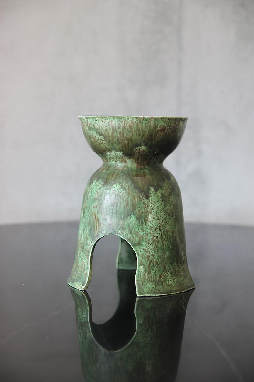 Unique shape and color object, perfect for brightening up any space. The classic design is  timeless, adding a touch of elegance to any room. This piece is signed by the artist, adding a personal and unique touch to the decor. For a closer look,