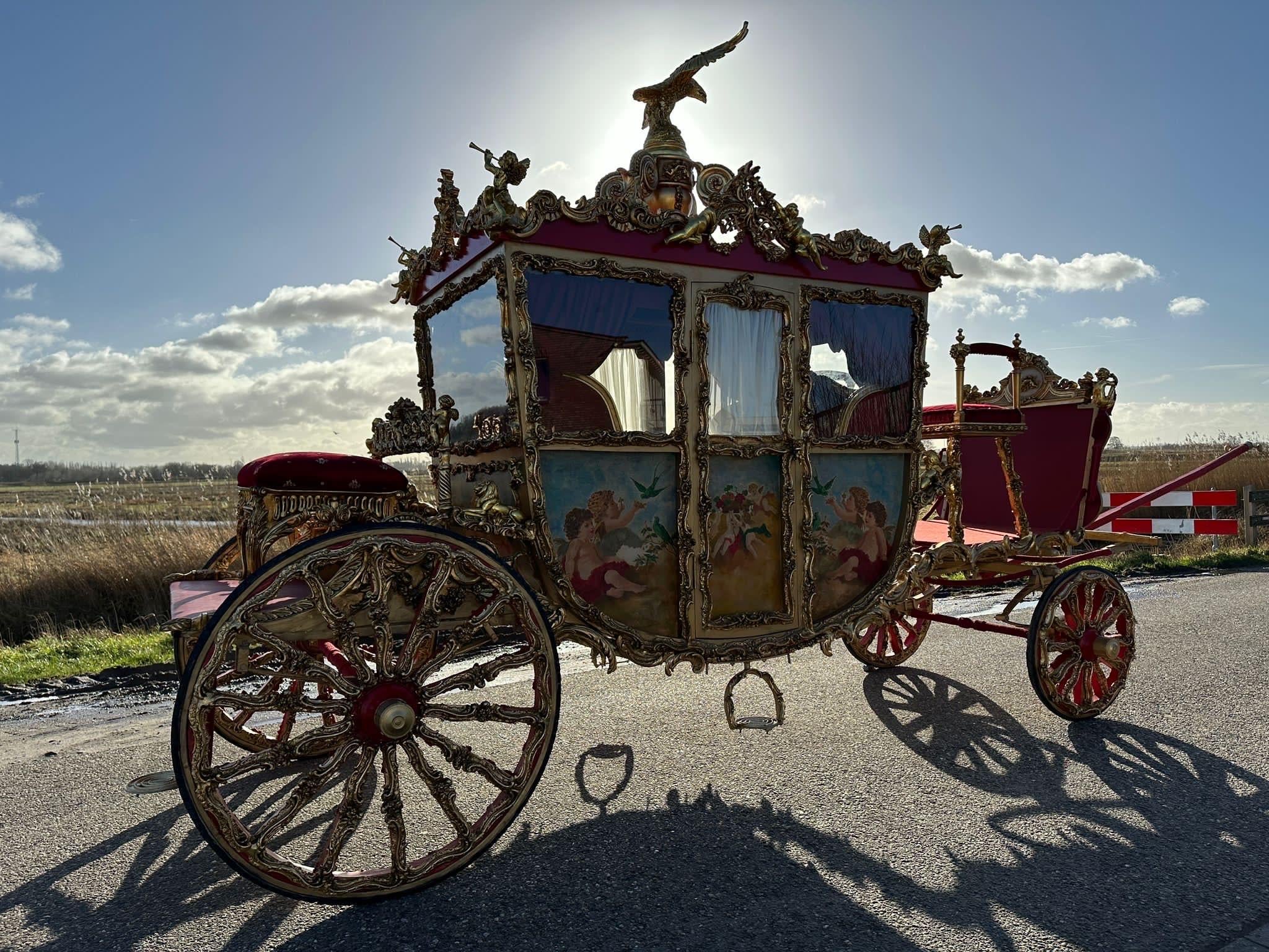 Introducing the epitome of regal elegance and opulence, behold the majestic royal carriage. This exquisite masterpiece of craftsmanship and design stands as a symbol of prestige and grandeur. 

From the moment you lay eyes on it, the carriage's