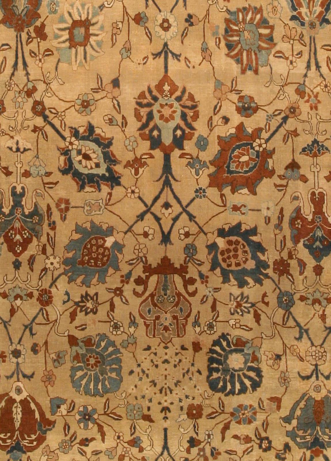 Extra large antique Persian Tabriz handmade rug.
Size: 15'10
