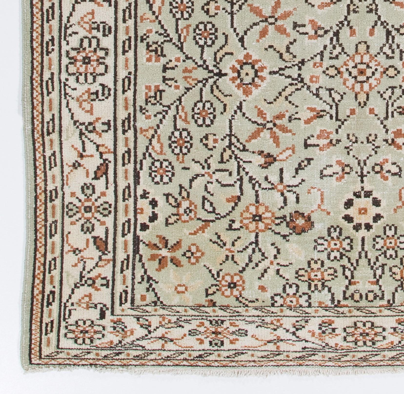 Oushak 6.2x9 ft Vintage Hand-Knotted Turkish Floral Wool Rug in Cream and Pastel Green For Sale