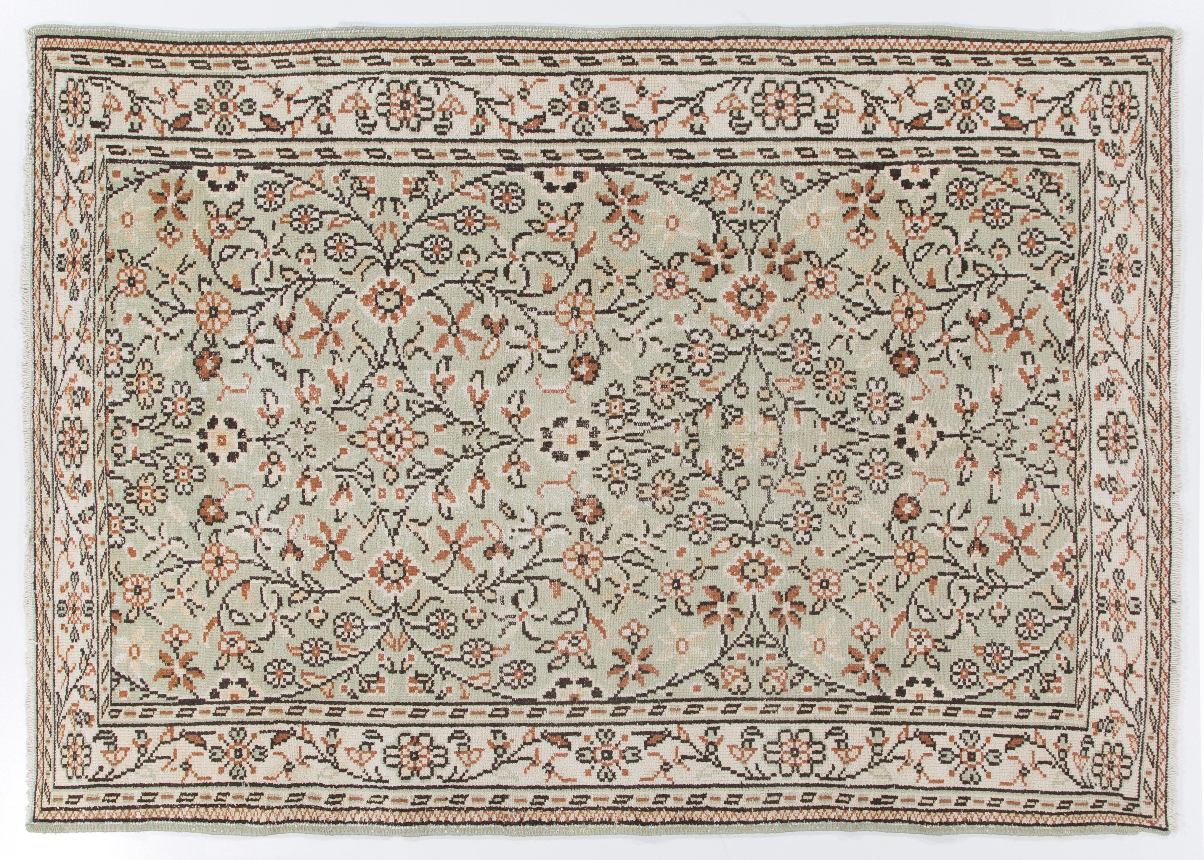 6.2x9 ft Vintage Hand-Knotted Turkish Floral Wool Rug in Cream and Pastel Green In Good Condition For Sale In Philadelphia, PA