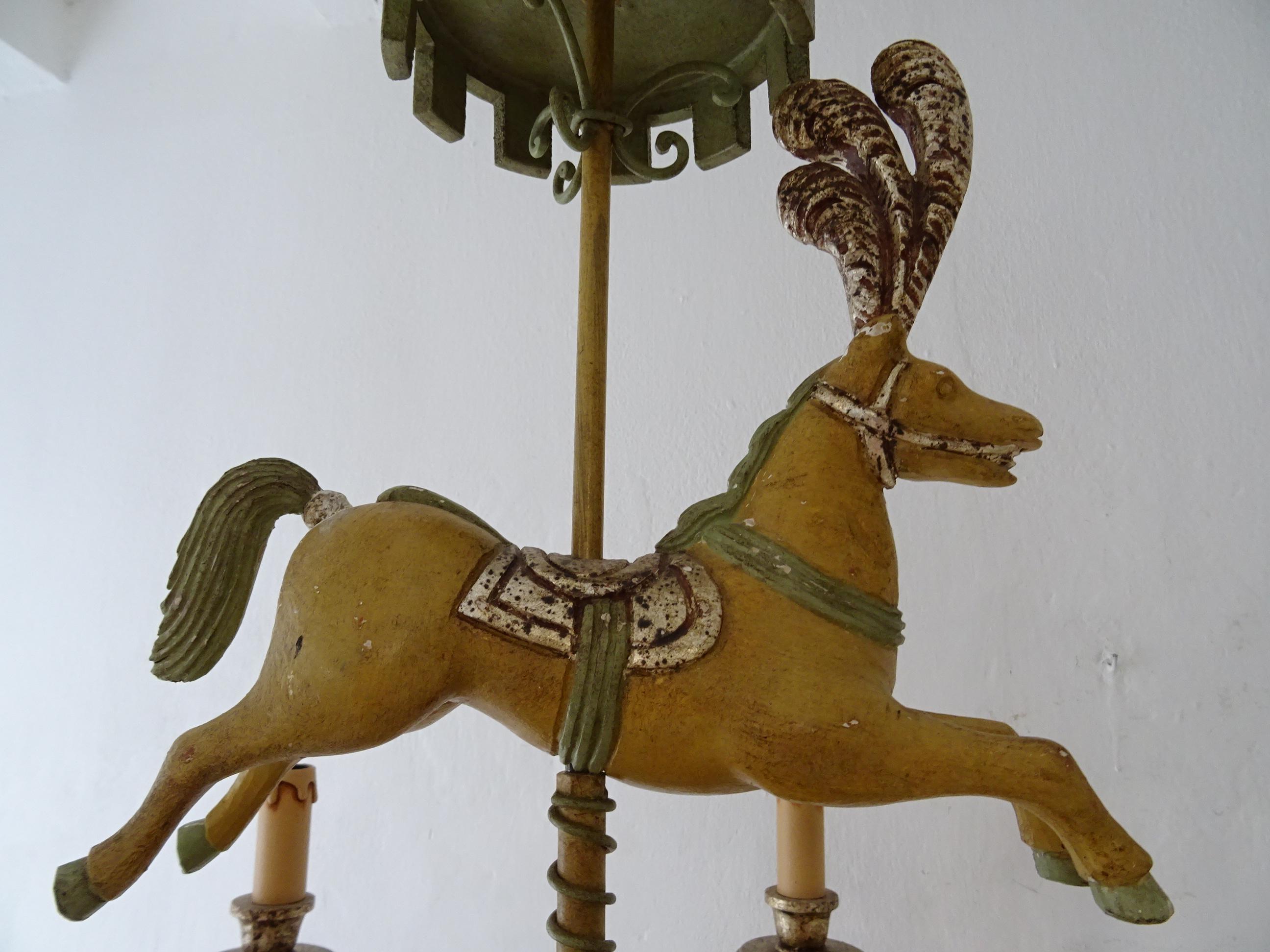 Housing 6 lights. Will be newly rewired with certified UL US sockets for the United States and appropriate sockets for all other countries and ready to hang. Original color tole polychrome throughout. Incredible details on horse with feathers. Horse