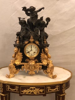 One of a Kind French Patinated and Dore Bronze Figural Mantle Clock