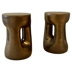 Sgabelli o tavolini in ceramica smaltata color bronzo dorato, unici nel loro genere, firmati da Dalo
