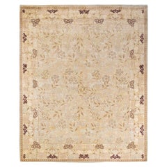 Tapis unique en son genre, nou  la main, de style oriental clectique, bleu clair.