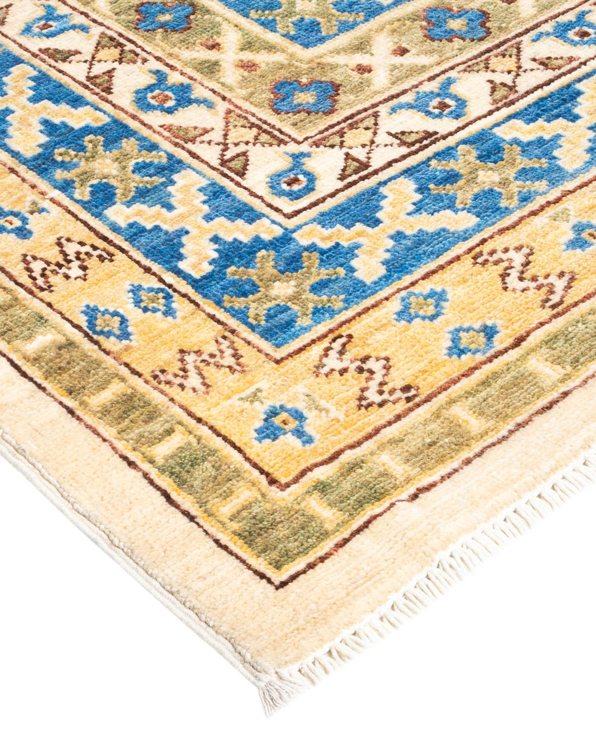 The city of Khotan was a key trading post along the Silk Road, and the rugs woven there for centuries incorporated Chinese, Persian, and Western influences. Hand-knotted of soft, durable wool, this collection pays tribute to the original inventive