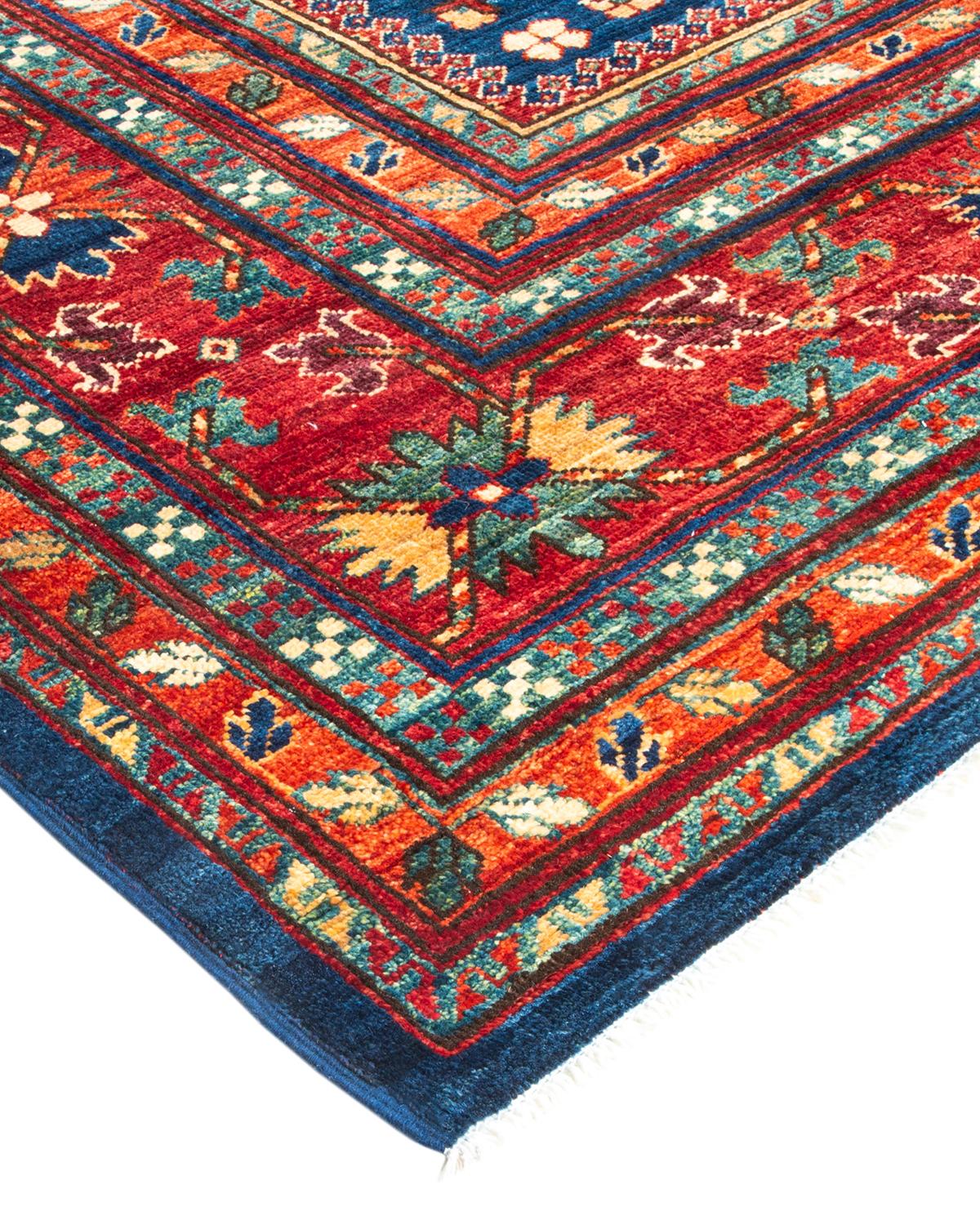 Persian rug-making at its finest inspired the rich colors, elaborate geometric motifs, and botanical detailing of the Serapi collection. With as many as 100 knots per inch, these handcrafted rugs are as durable as they are visually stunning, and