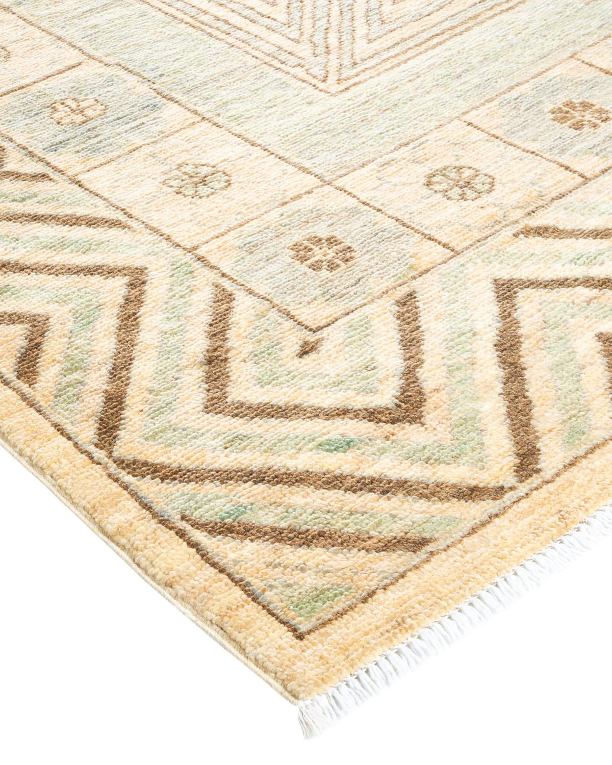 The city of Khotan was a key trading post along the Silk Road, and the rugs woven there for centuries incorporated Chinese, Persian, and Western influences. Hand-knotted of soft, durable wool, this collection pays tribute to the original inventive