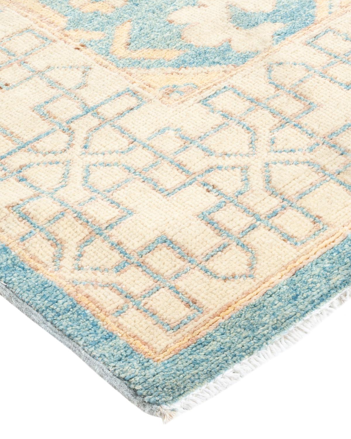 The city of Khotan was a key trading post along the Silk Road, and the rugs woven there for centuries incorporated Chinese, Persian, and Western influences. Hand-knotted of soft, durable wool, this collection pays tribute to the original inventive