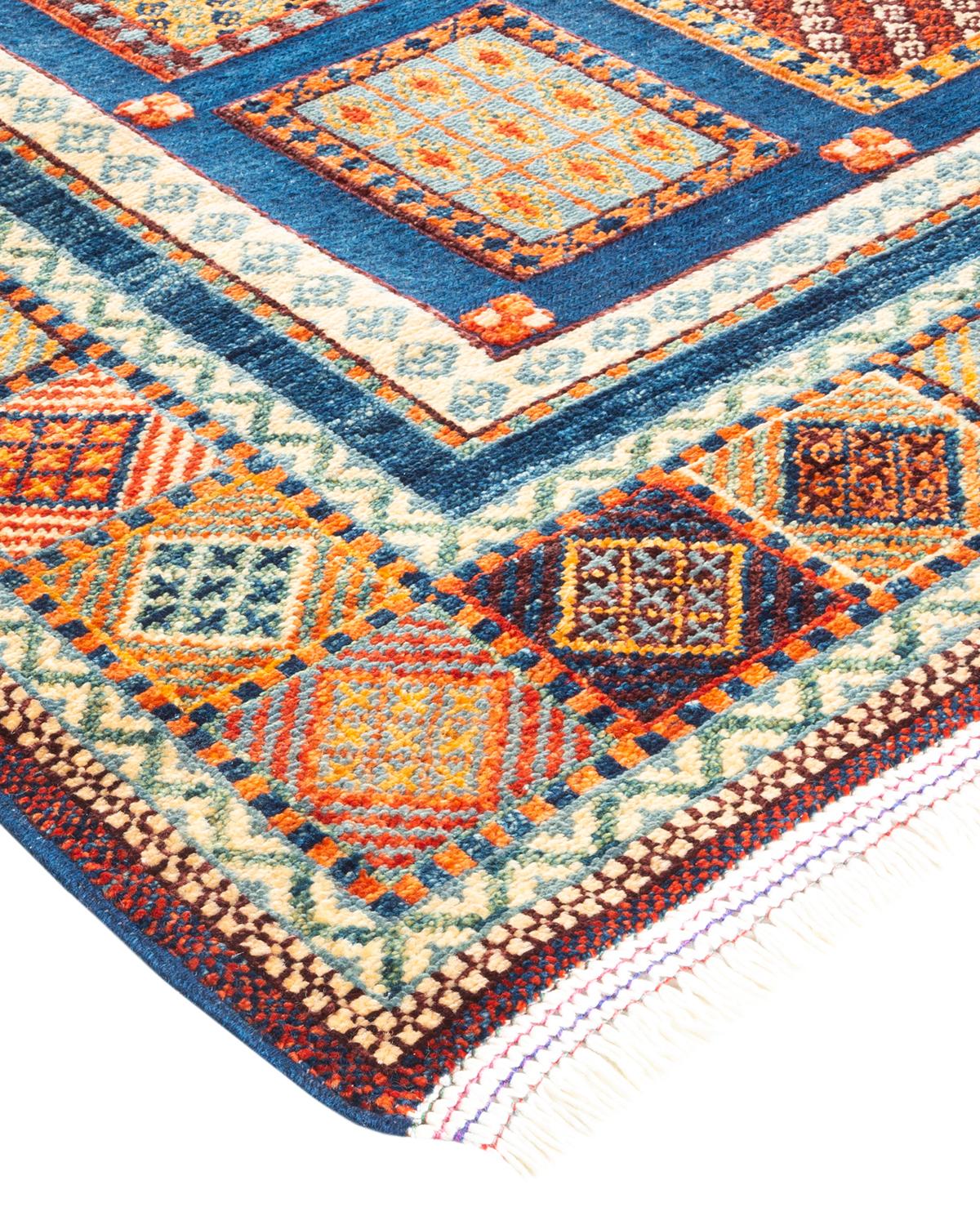 The rich textile tradition of western Africa inspired the Tribal collection of hand-knotted rugs. Incorporating a medley of geometric motifs, in palettes ranging from earthy to vivacious, these rugs bring a sense of energy as well as plush texture