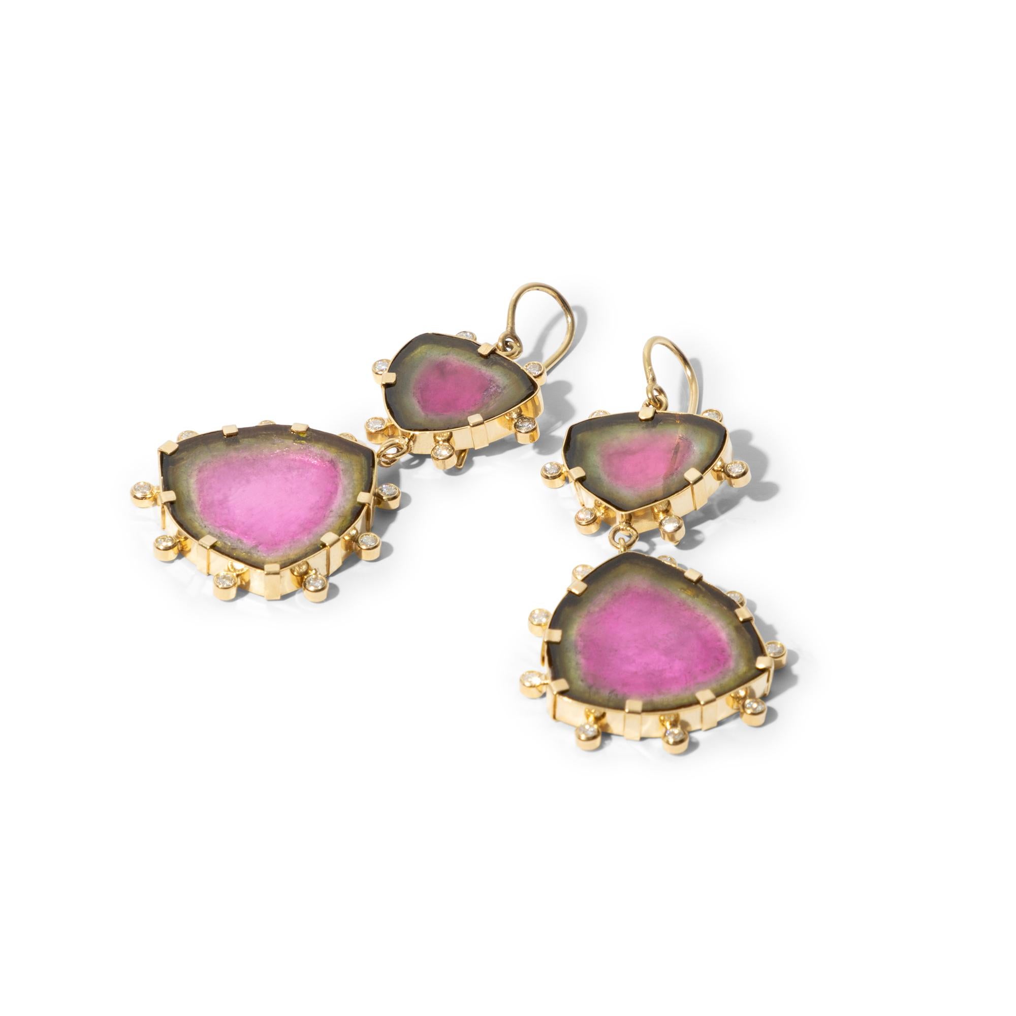 Make an entrance with this extraordinary pair of statement earrings consisting of four sumptuous slices of watermelon tourmaline in the most vibrant pink and green. A fine example of luxurious sophistication. The tourmalines have a total weight of