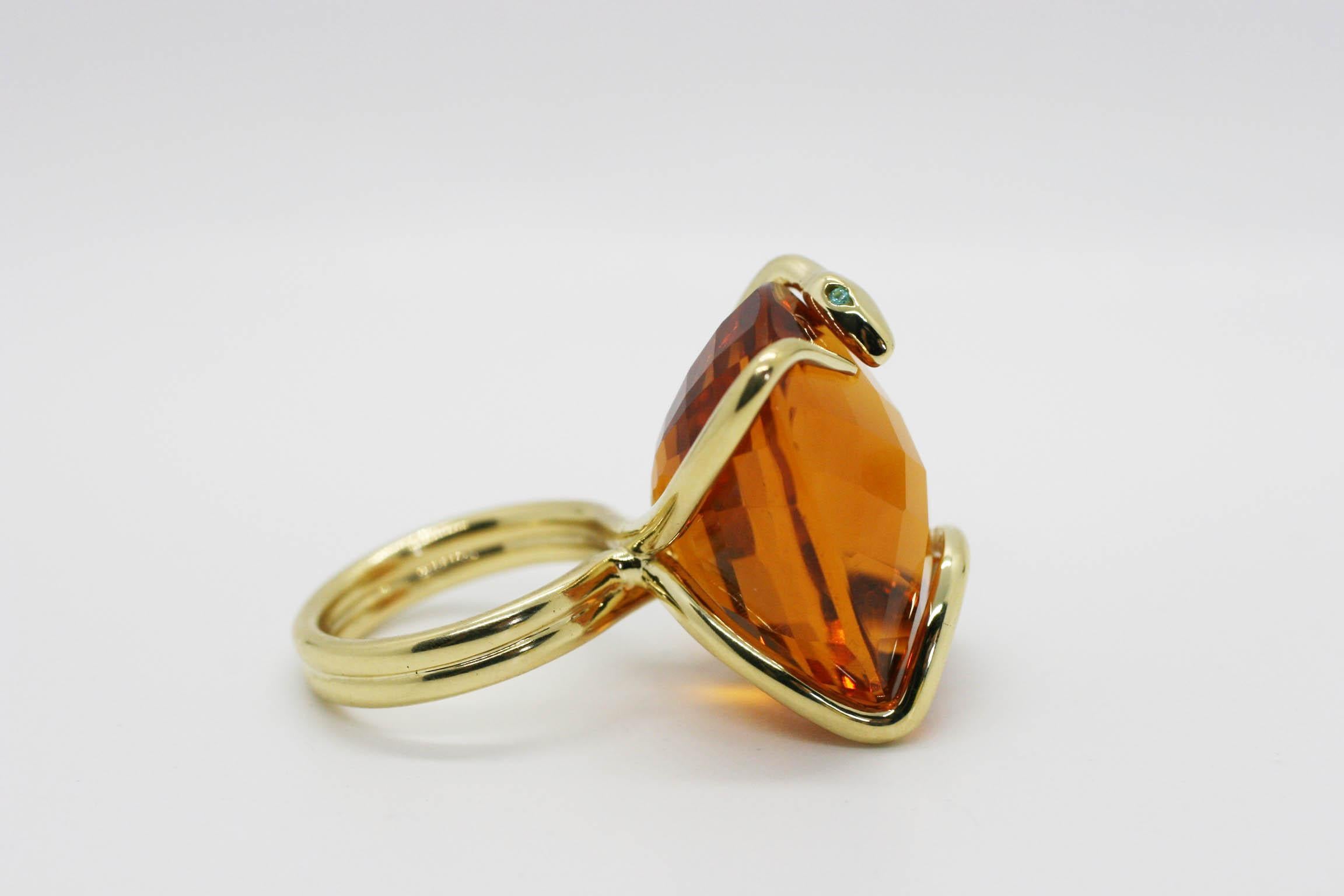 Perez Bitan's Infinity Citrine Snake Cocktail Ring features Perez Bitan's signature curved snake with tourmaline eyes that wraps around the finger and frames the large Madeira citrine, set in 18k Yellow Gold
Over 47 carats Madeira Citrine from