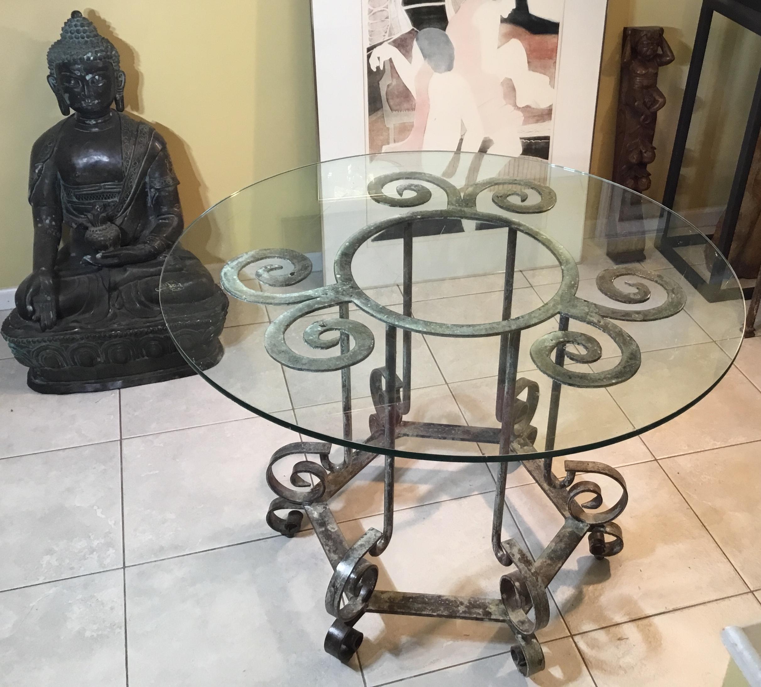 Exceptional table made of handcrafted solid steel, artistic spiral hand forged top, with six sides legs bottom base. Great looking grayish patina, the Table is professionally treated and seal for rust.
Can be use as dining table or center