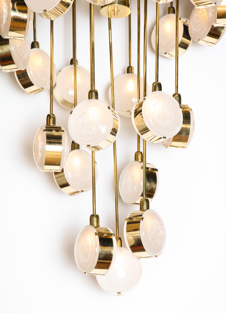 Mid-Century Modern Large Brass and Clear Murano Glass Disc Spiral Cascading Chandelier, Italy For Sale