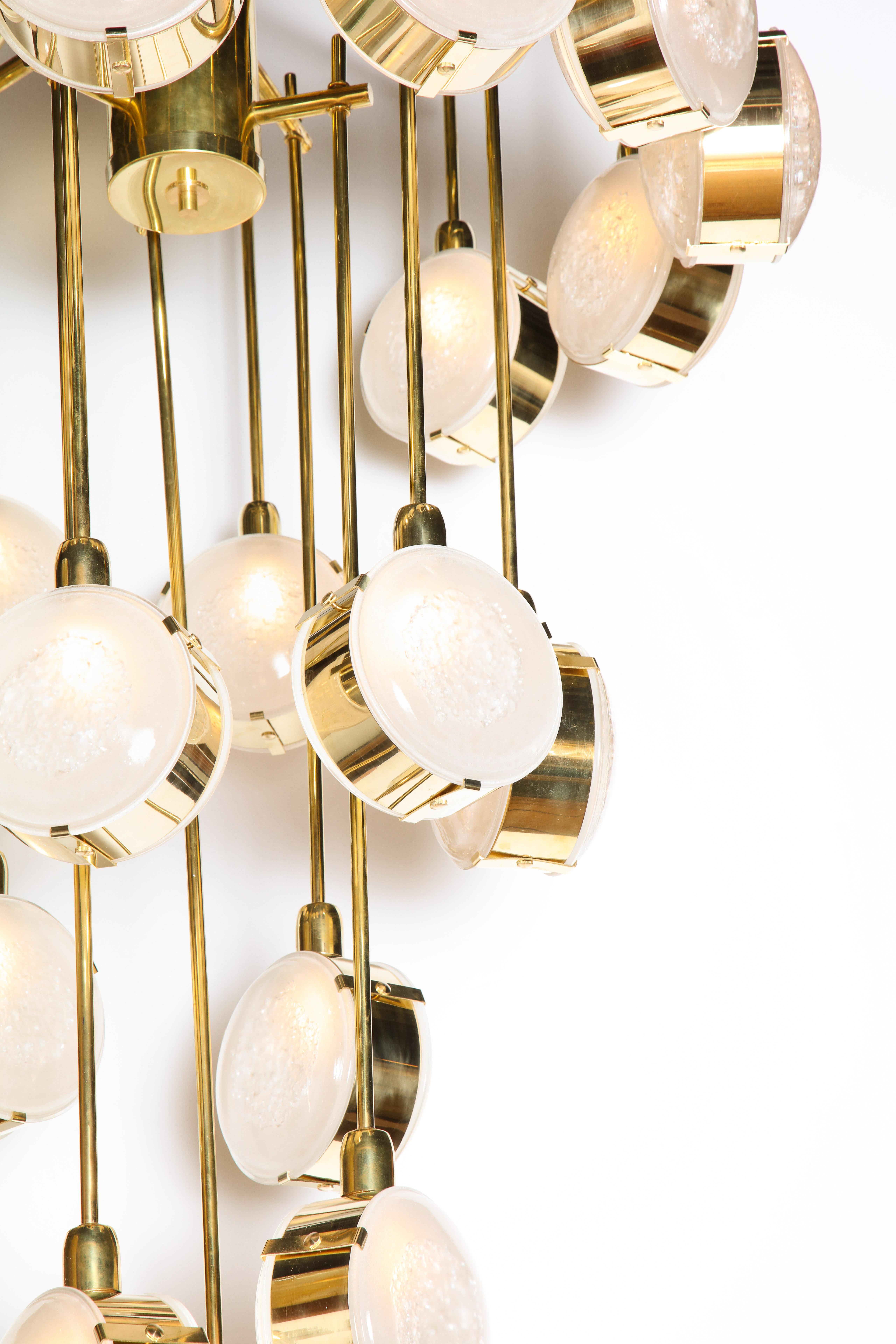 Mid-Century Modern Large Brass and Clear Murano Glass Disc Spiral Cascading Chandelier, Italy