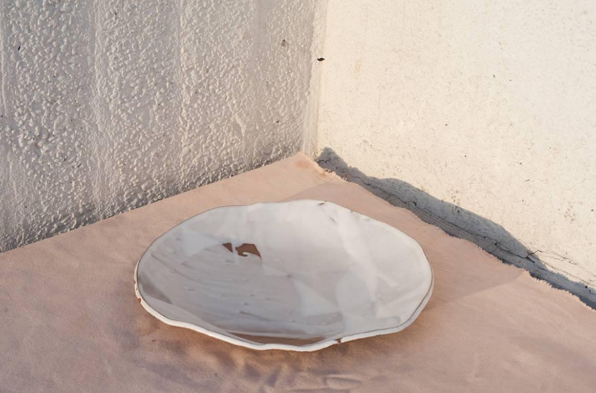 Hand-built platters, perfectly suited to serving or display. Multiple layers of white glaze poured on brown stoneware clay body, which has been left unglazed around the edges for a painterly effect.

Food safe.

 Made to order. Due to the nature