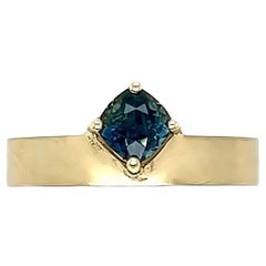 Used One of a Kind Off Set Cushion Teal Sapphire Solitaire Ring.
