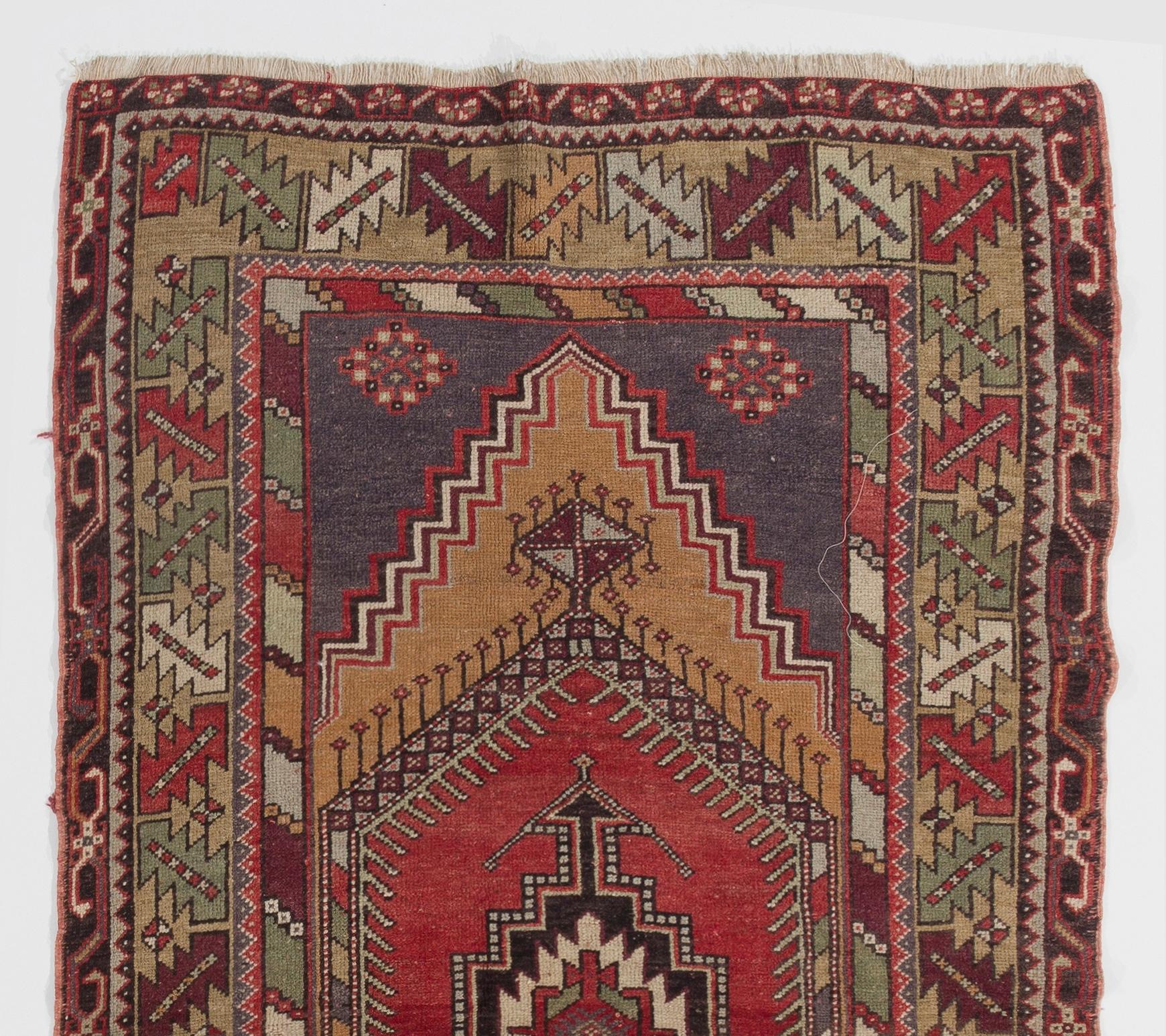 A vintage handmade Central Anatolian rug with a geometric design and beautiful soft colors. Measures: 3.6 x 6.6.

Finely hand knotted with even medium wool pile on wool foundation.

Sturdy and as clean as a brand new rug (deep washed