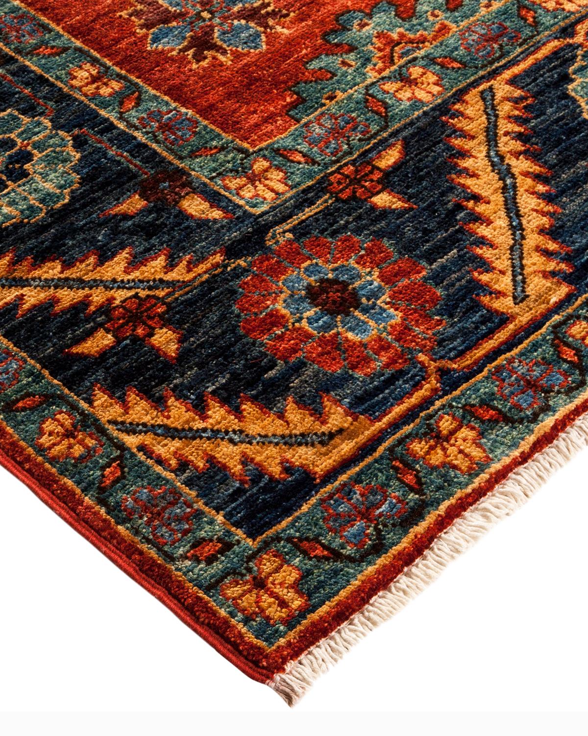 Color: Crimson. Made in: Pakistan. 100% wool. Persian rug-making at its finest inspired the rich colors, elaborate geometric motifs, and botanical detailing of the Serapi collection. With as many as 100 knots per inch, these handcrafted rugs are as