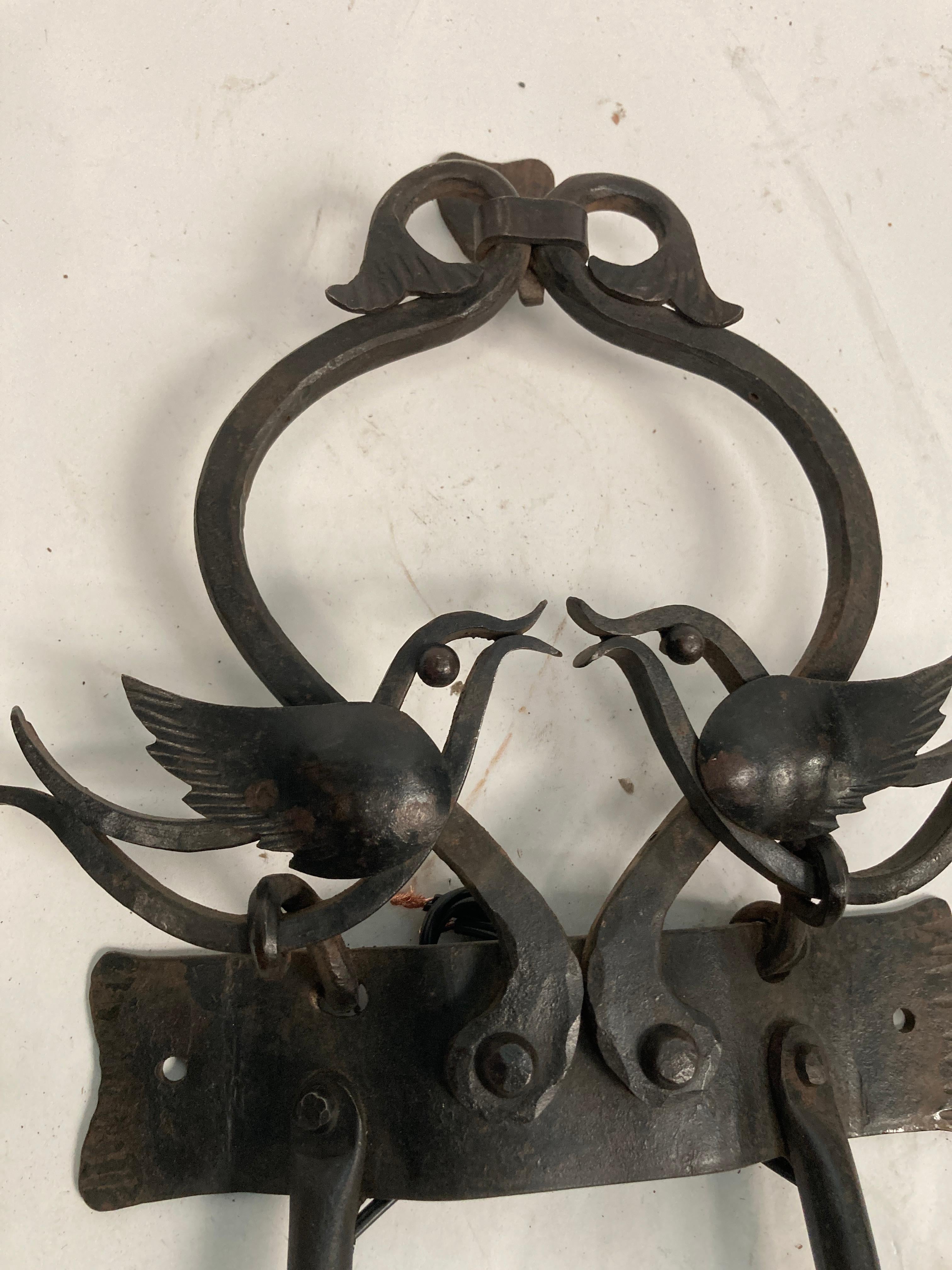 Metal One of a kind pair of craftwork wall sconces For Sale
