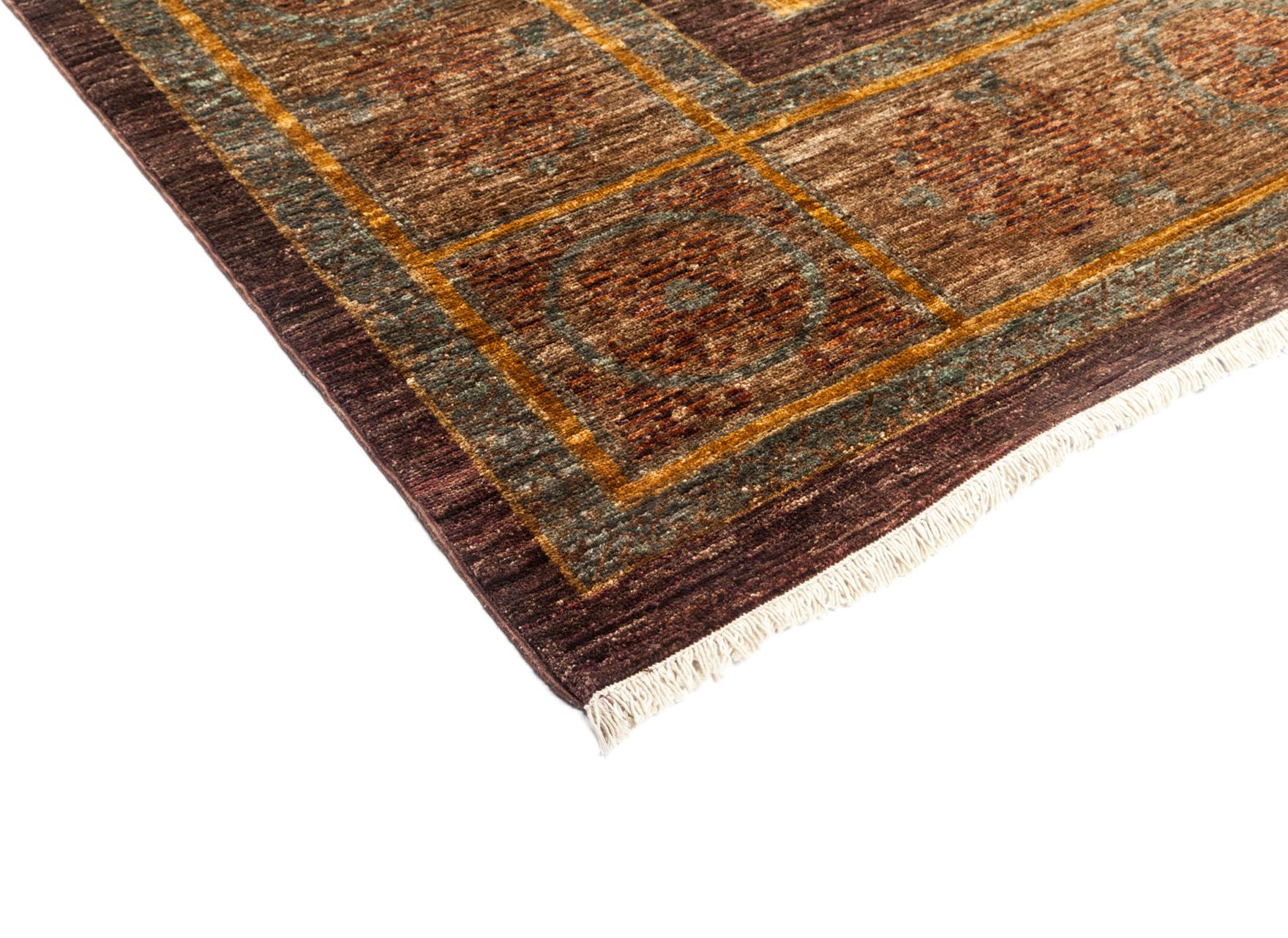 Color: Brown, made in Pakistan. 100% wool. Whether boasting a field of flowers or ancient tribal symbols, patterned rugs are the easiest way to enrich a space. Subtle colors and intricate motifs reinforce the quiet sophistication of a traditional