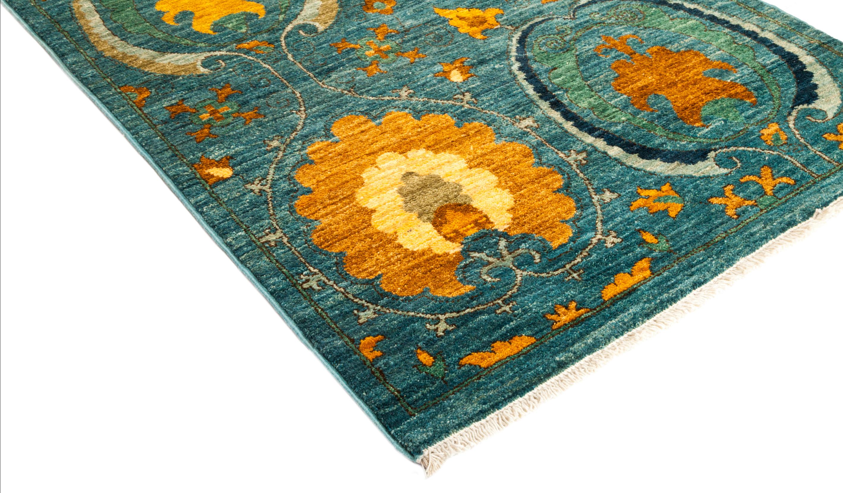 Color: Blue - Made in: Pakistan. 100% wool. Whether boasting a field of flowers or ancient tribal symbols, patterned rugs are the easiest way to enrich a space. Subtle colors and intricate motifs reinforce the quiet sophistication of a traditional