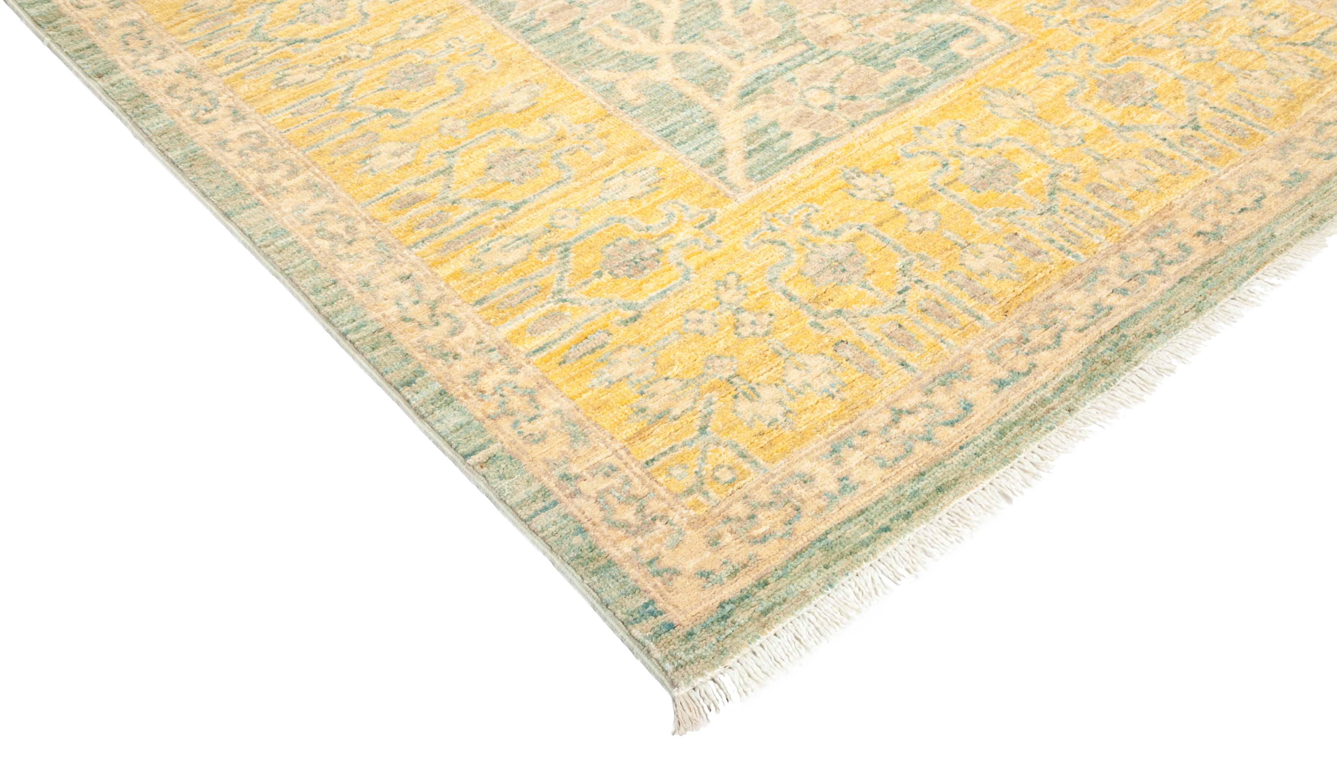Color: Green - Made in: Pakistan. 100% wool. Whether boasting a field of flowers or ancient tribal symbols, patterned rugs are the easiest way to enrich a space. Subtle colors and intricate motifs reinforce the quiet sophistication of a traditional