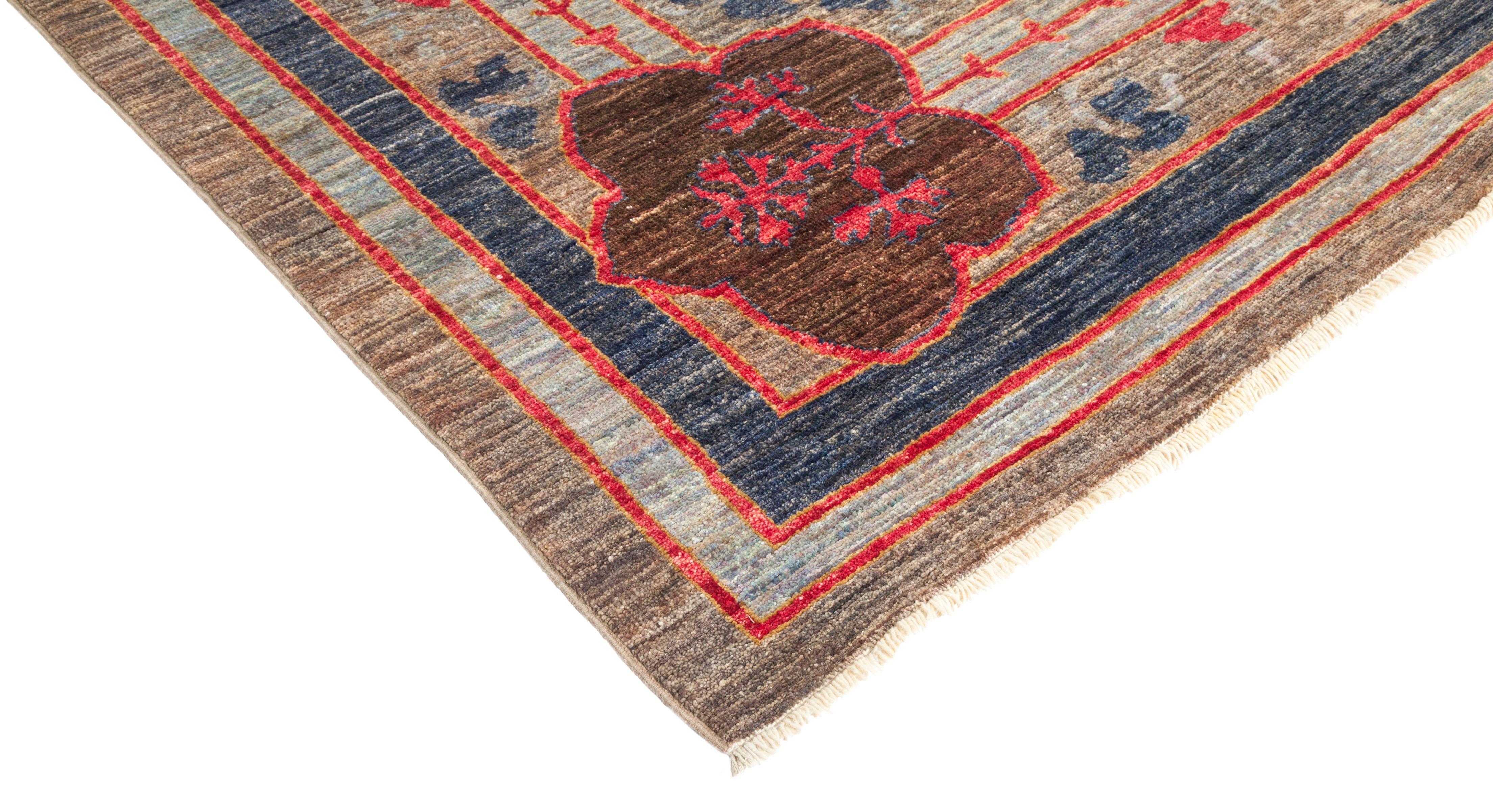 Color: Brown, made in Pakistan. 100% wool. Whether boasting a field of flowers or ancient tribal symbols, patterned rugs are the easiest way to enrich a space. Subtle colors and intricate motifs reinforce the quiet sophistication of a traditional