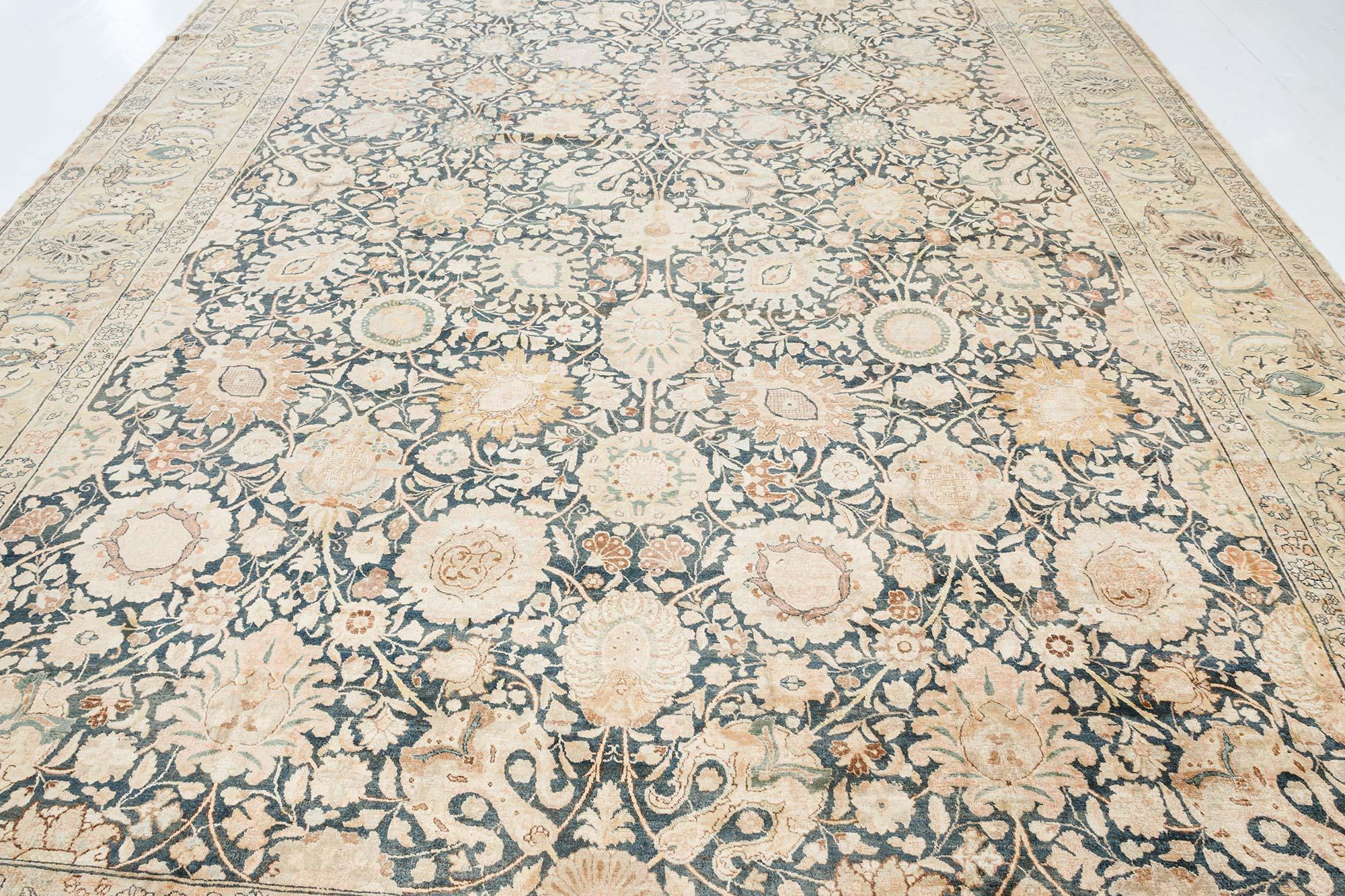 20th Century Antique Persian Tabriz Handwoven Wool Carpet For Sale